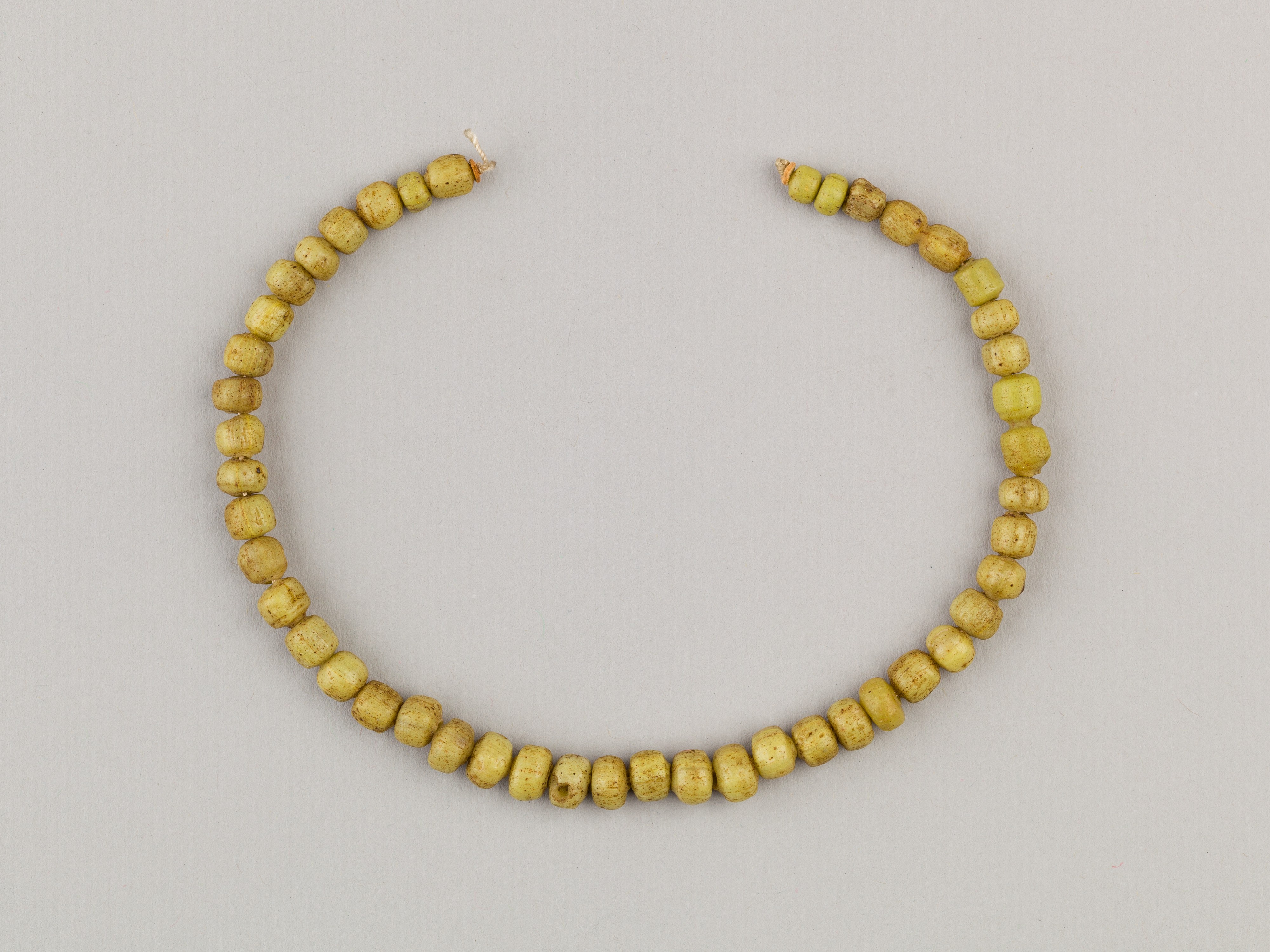 String of 46 disc beads