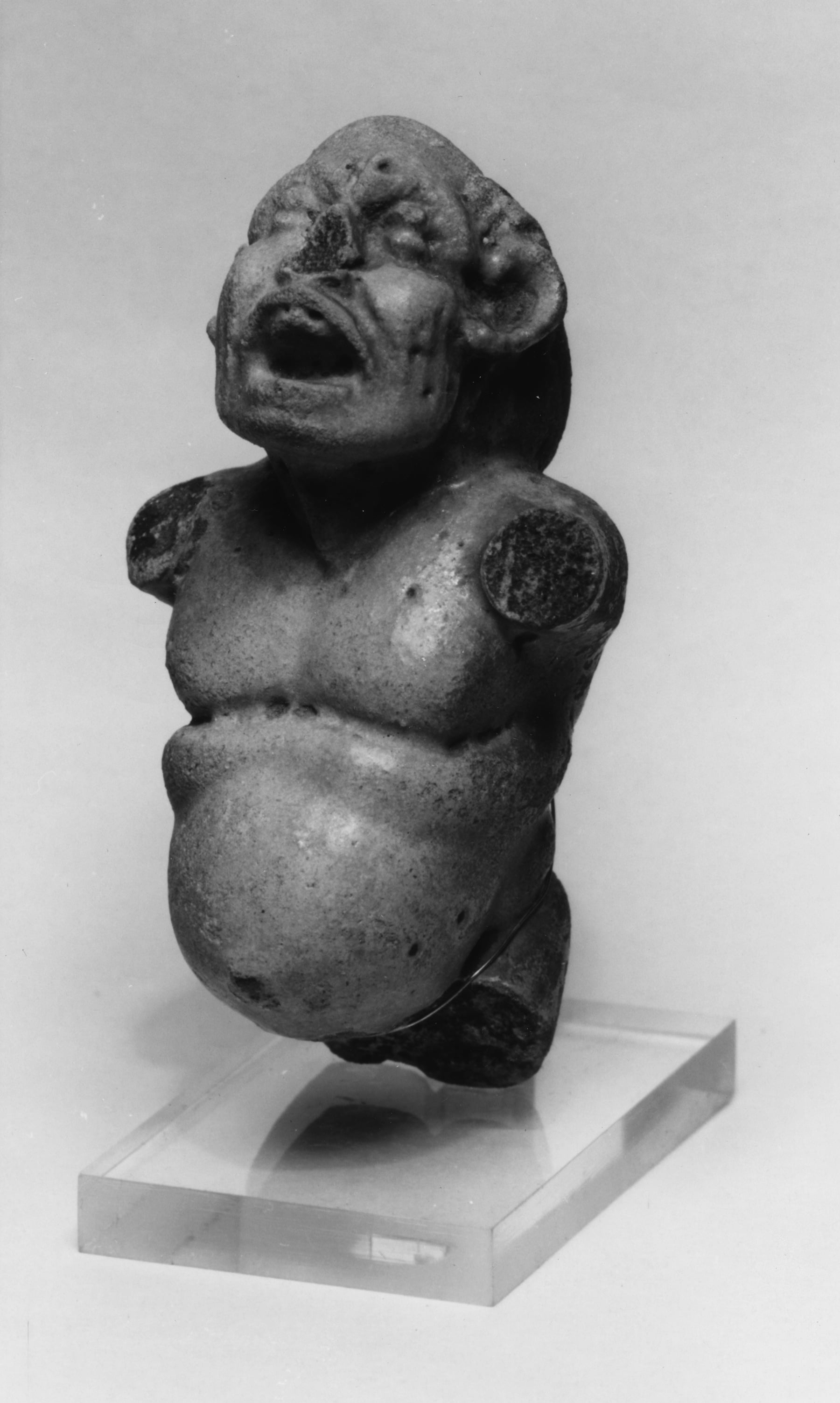 Figure with Open Mouth and Large Belly