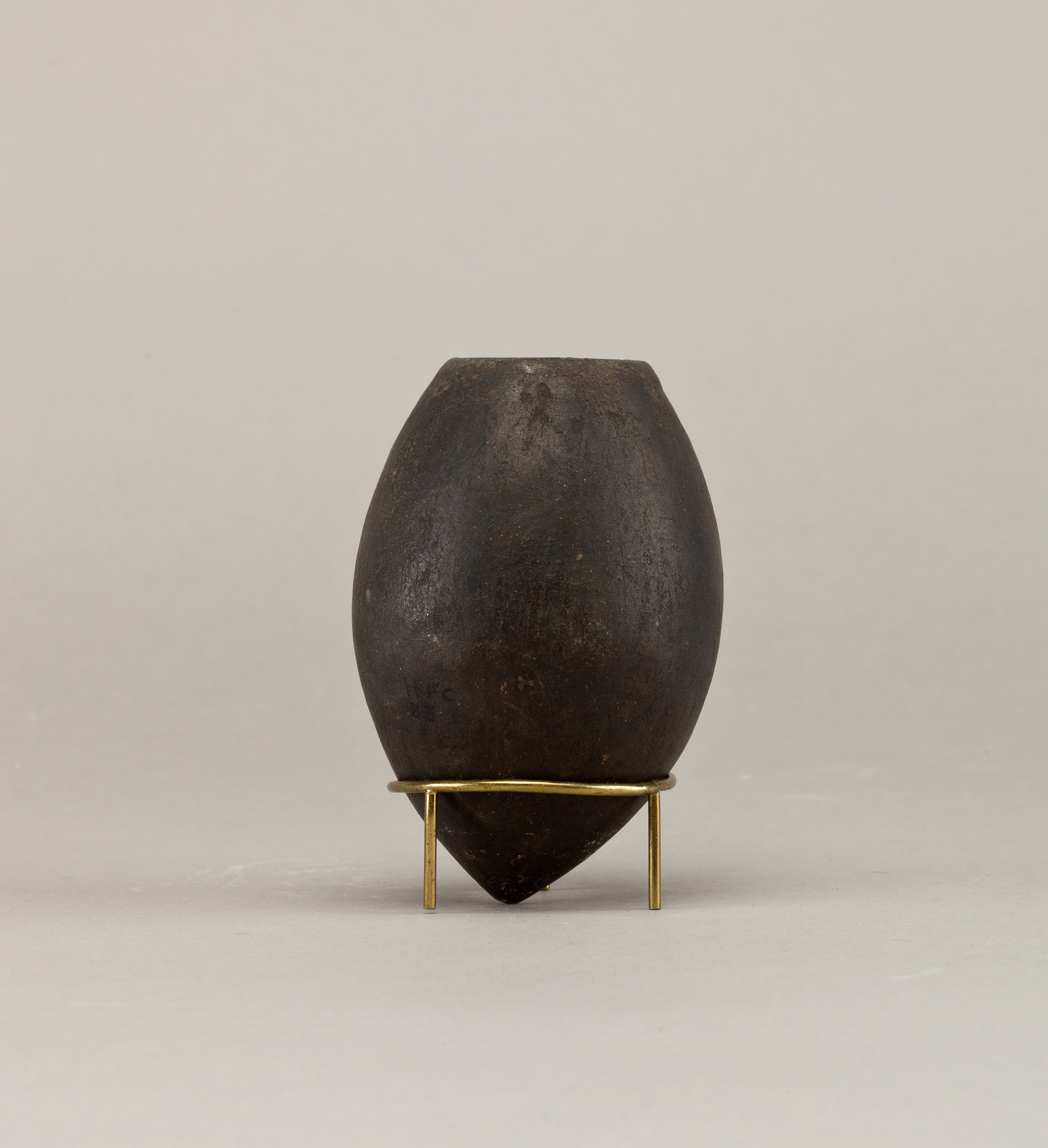 Black ware jar with pointed base