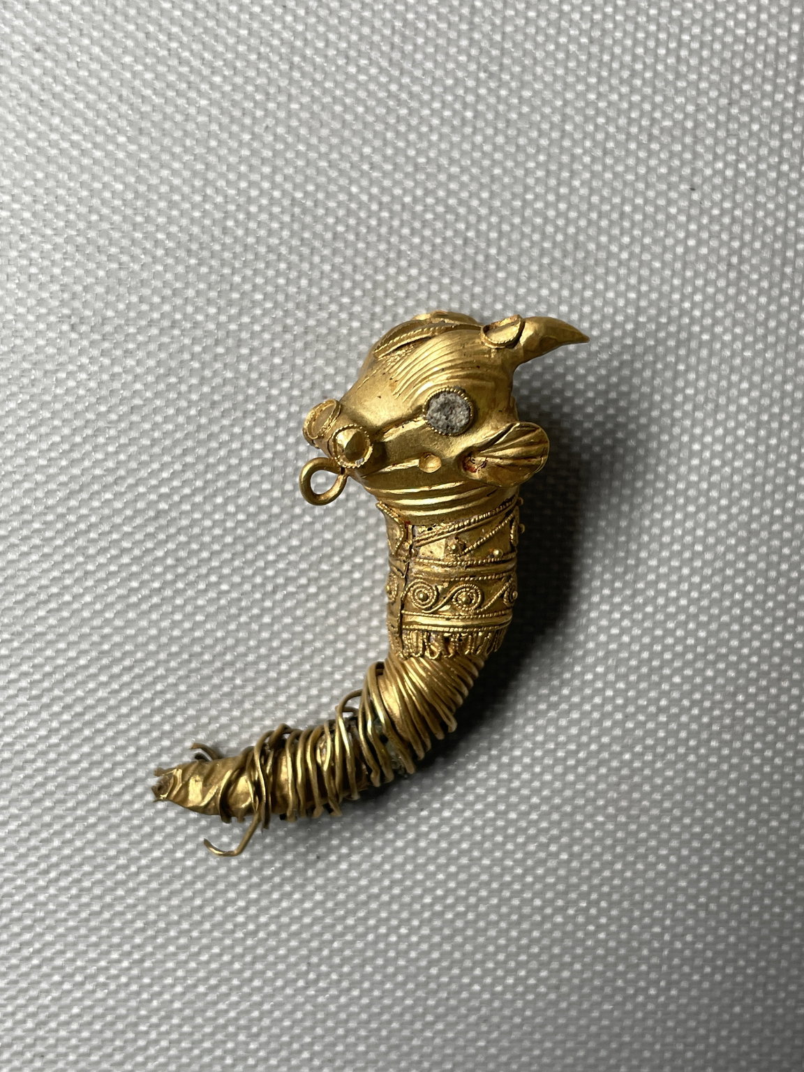 Part of a Very Large Earring with Bull's Head