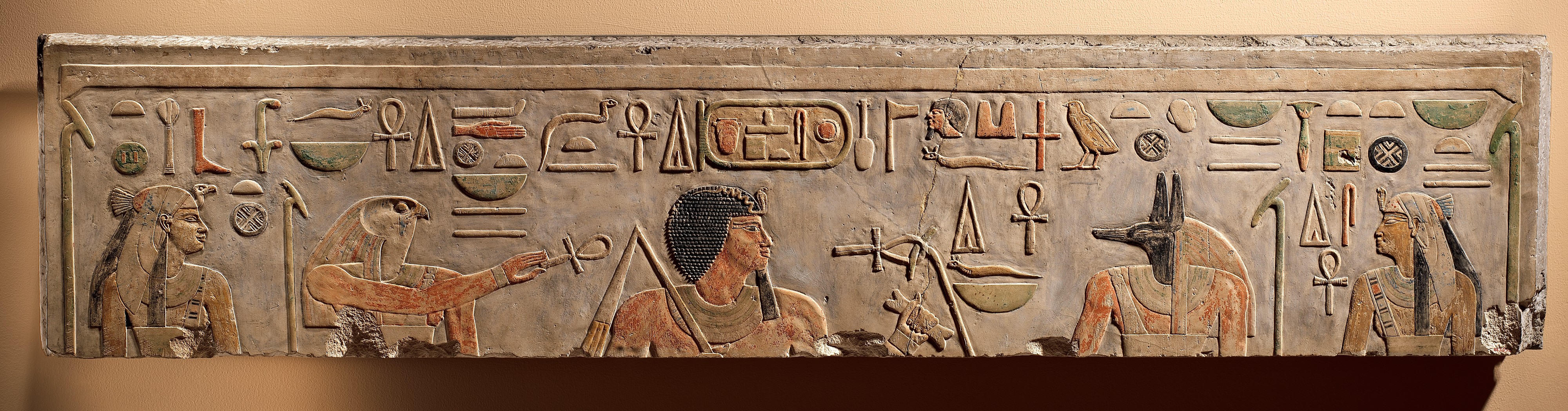 Lintel depicting King Amenemhat I flanked by Nekhbet, Horus, Anubis, and Wadjet