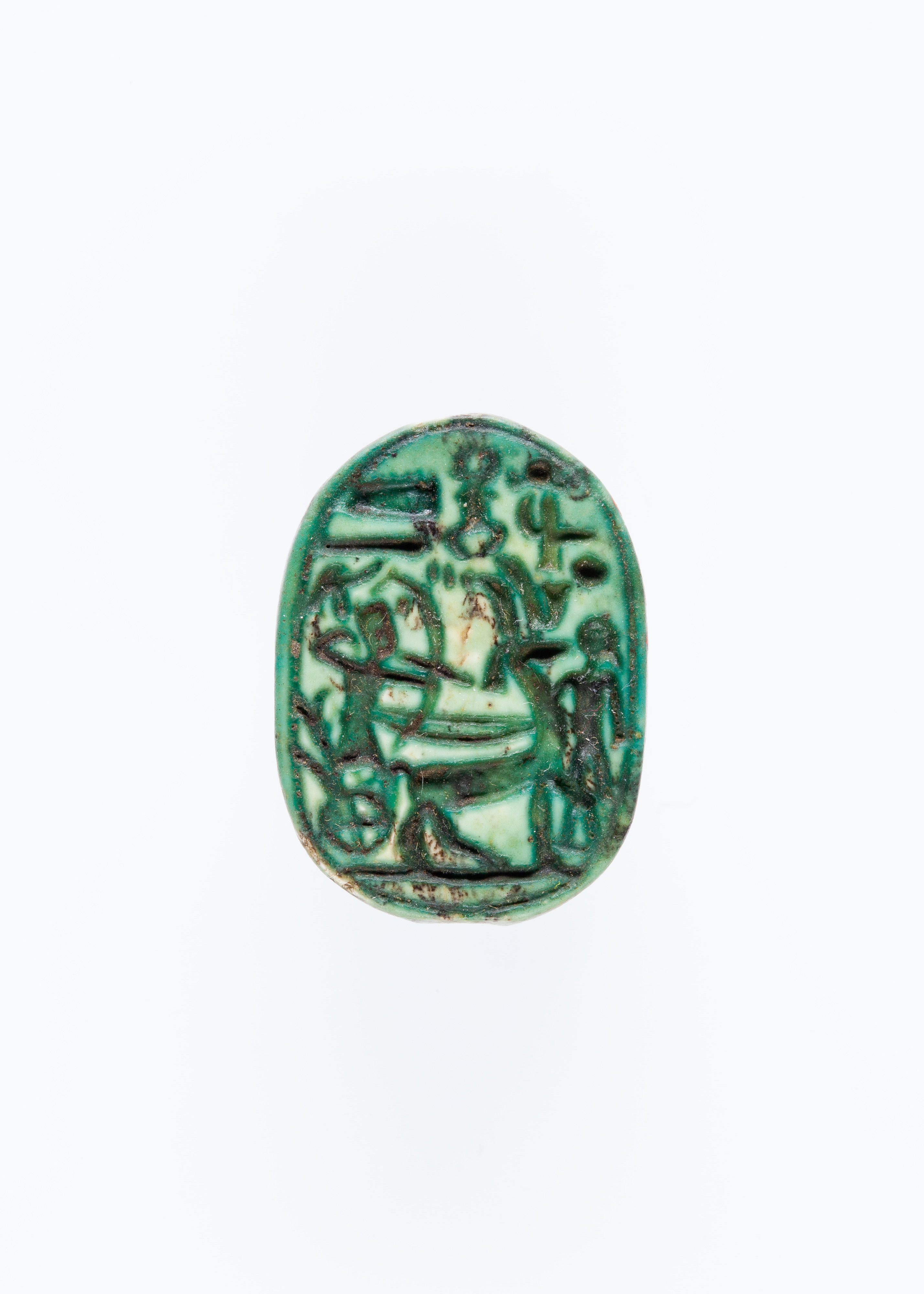 Scarab Depicting Seti II In His Chariot Shooting a Bow and Arrow.