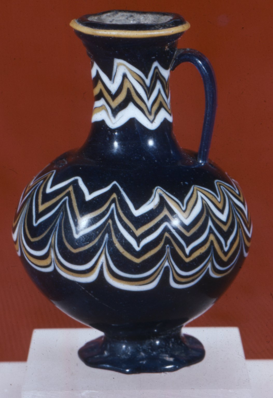 Polychrome Core-formed Bottle with Festooned Design