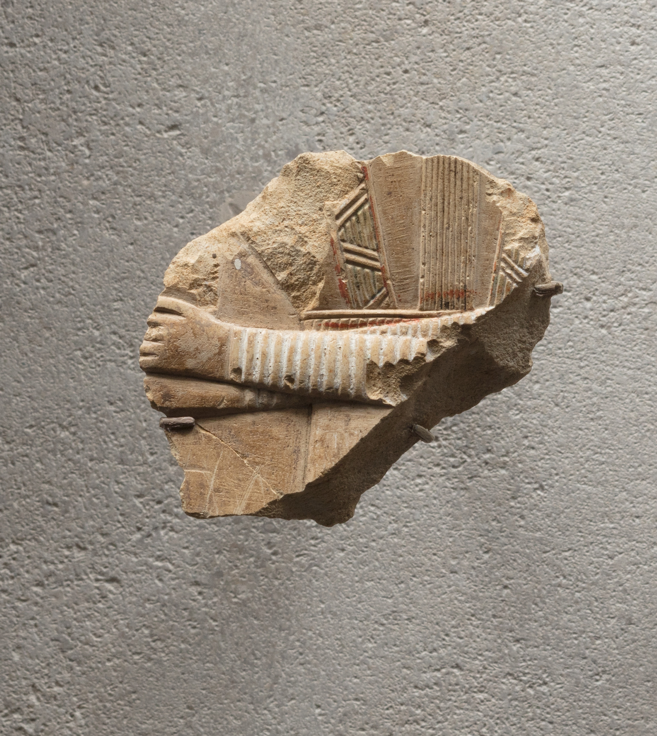 Relief of part of a richly adorned female figure - see 26.3.353-3