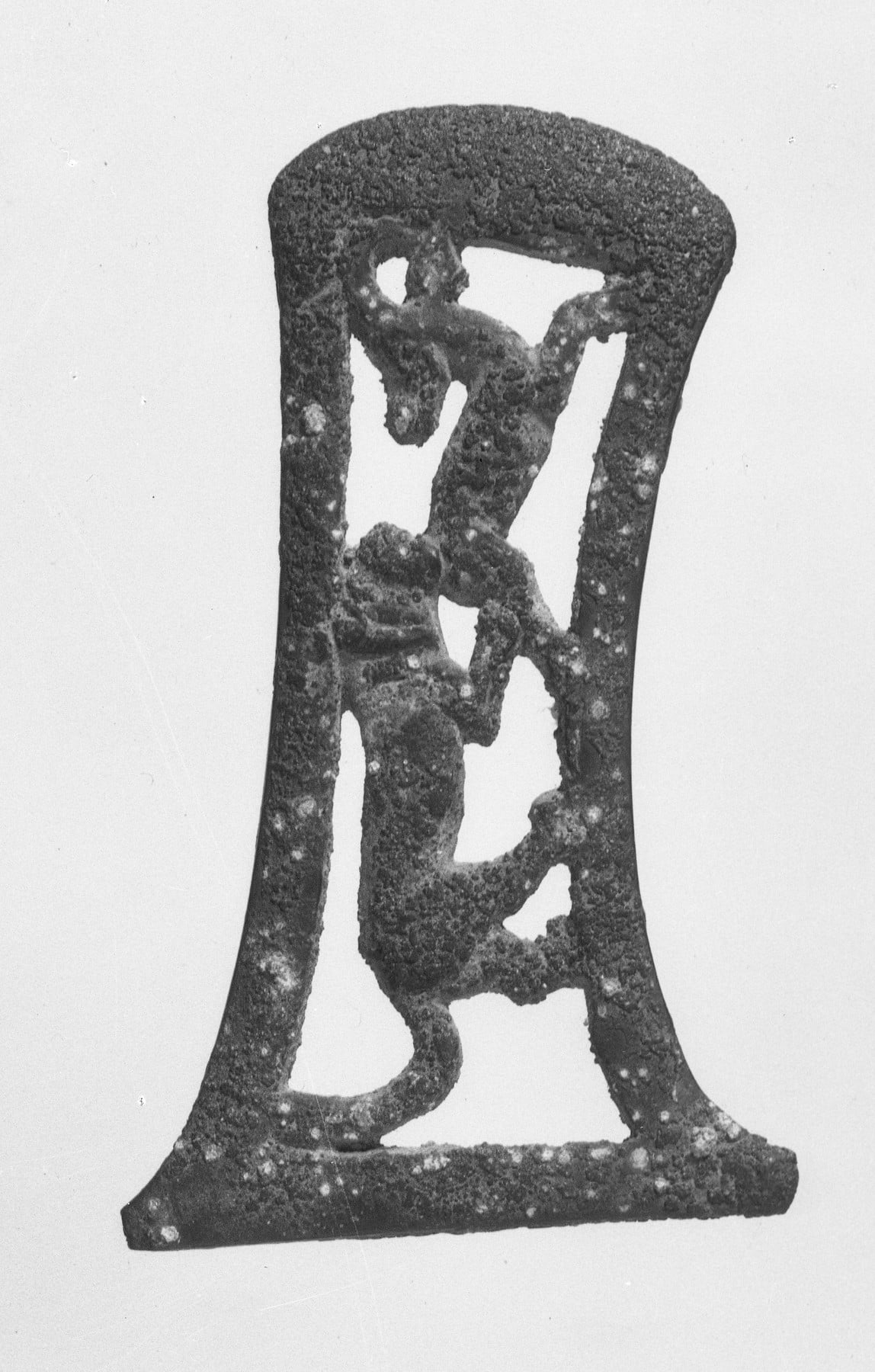 Openwork Axe Head with Lion Attack