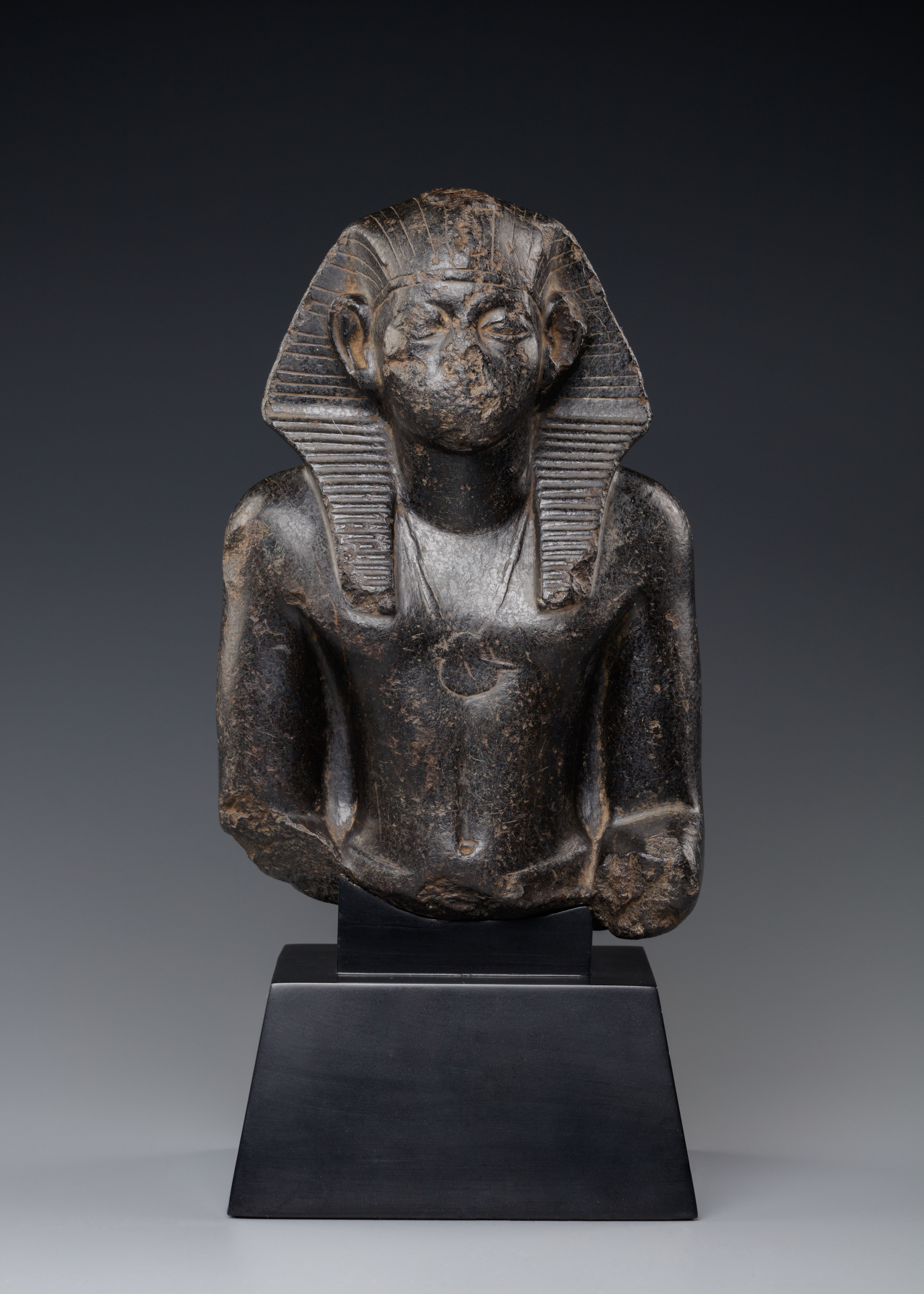 Upper Part of a Seated Statue of Pharaoh Senwosret III or Amenemhat III