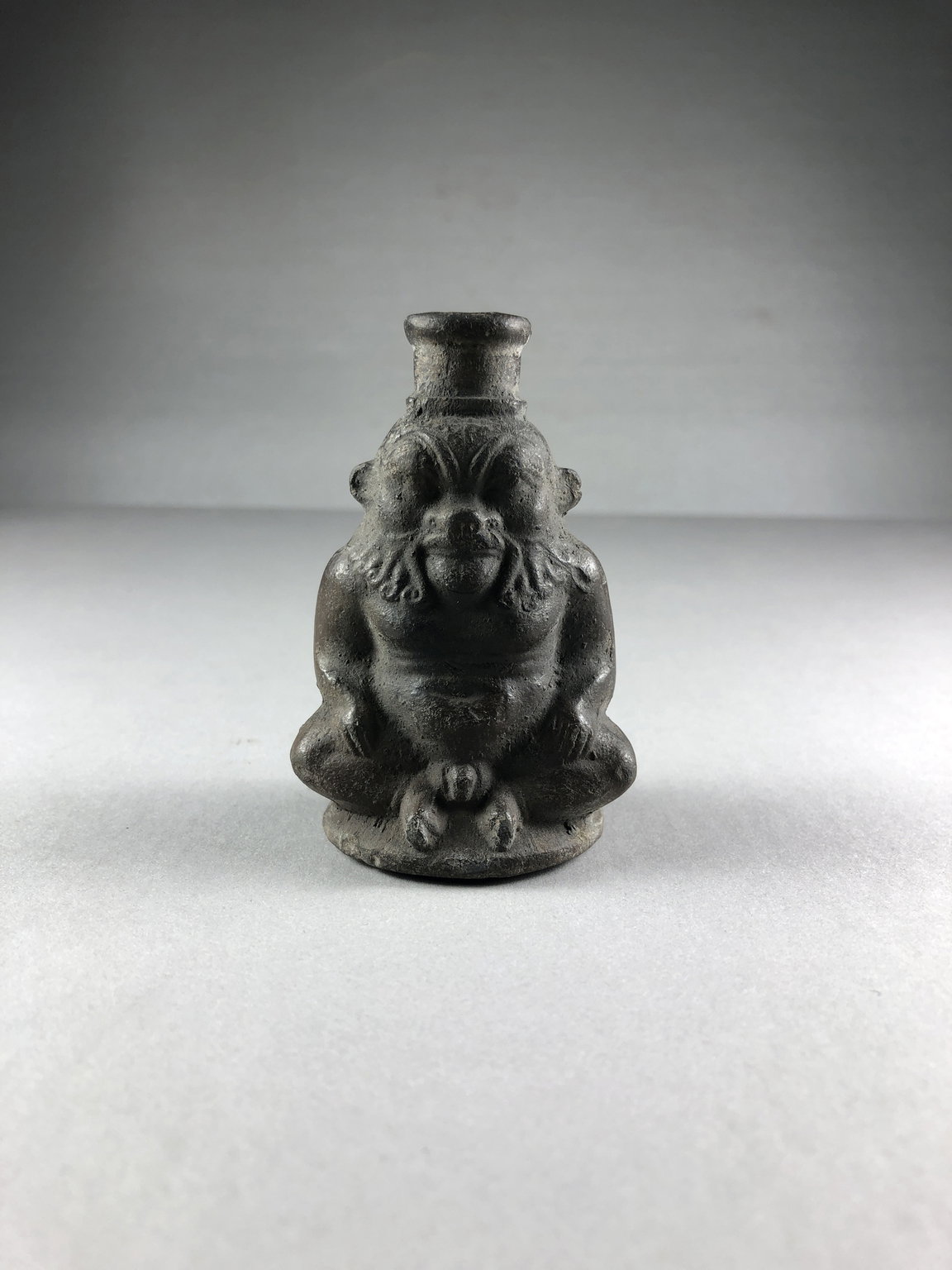 Small Bottle in the Form of the God Bes