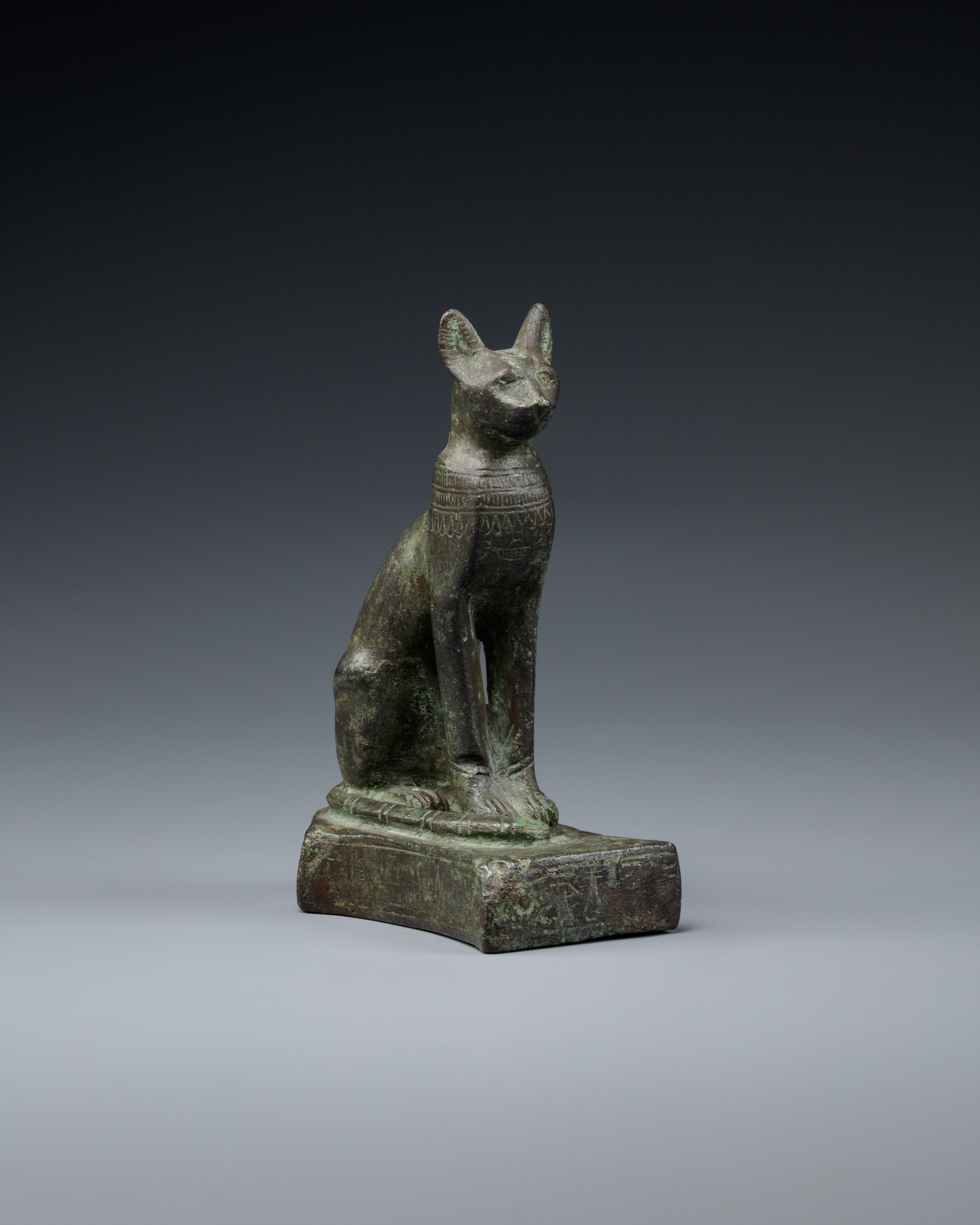 Cat with very worn inscription