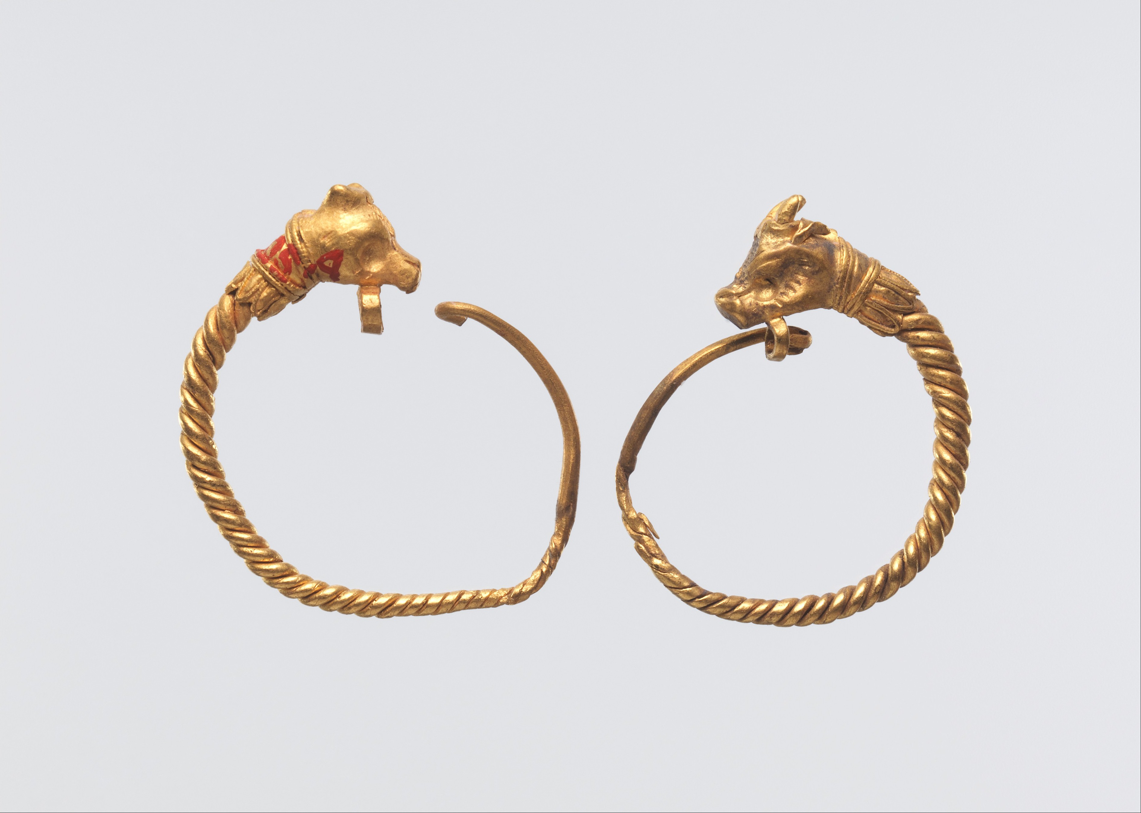 Earrings with bull head terminal