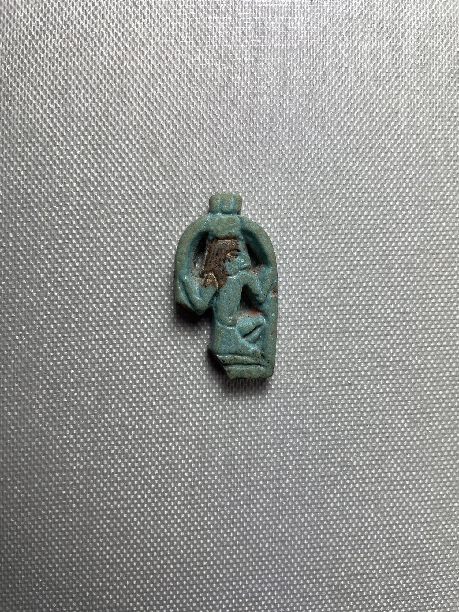 Amulet of the Deity Heh Holding Signs for Millions of Years