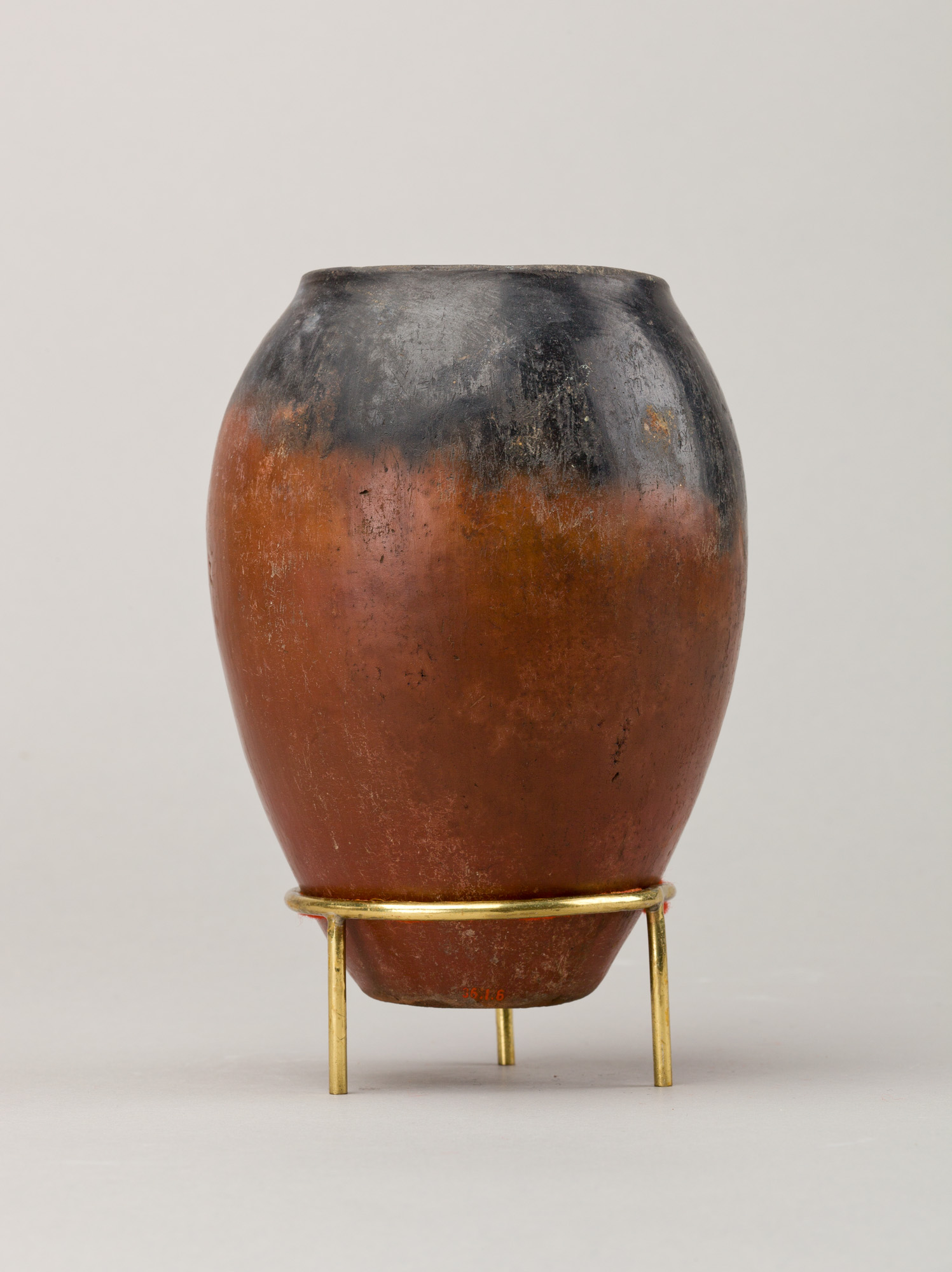 Black-topped red ware jar