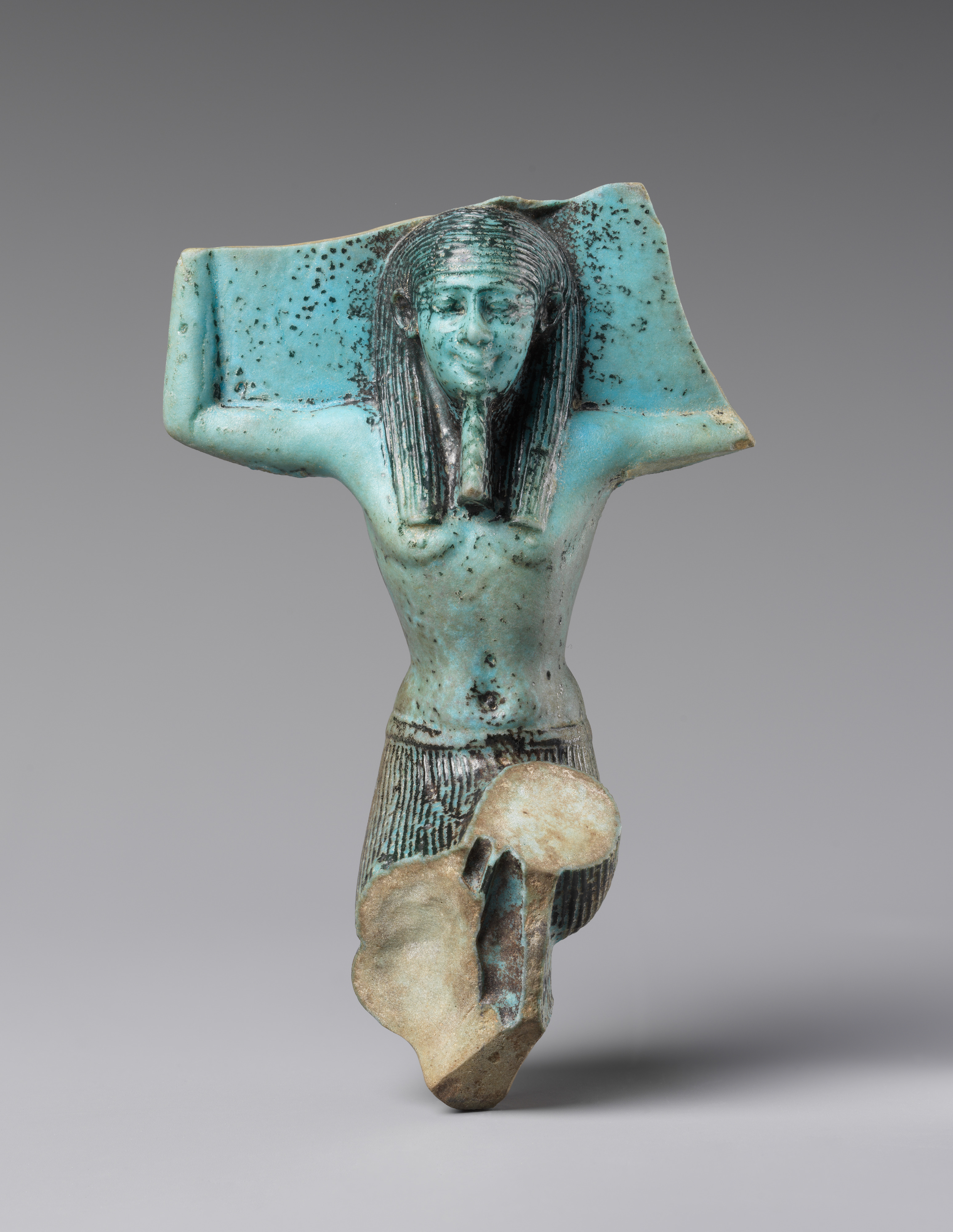 Figurine of a kneeling god, probably Shu