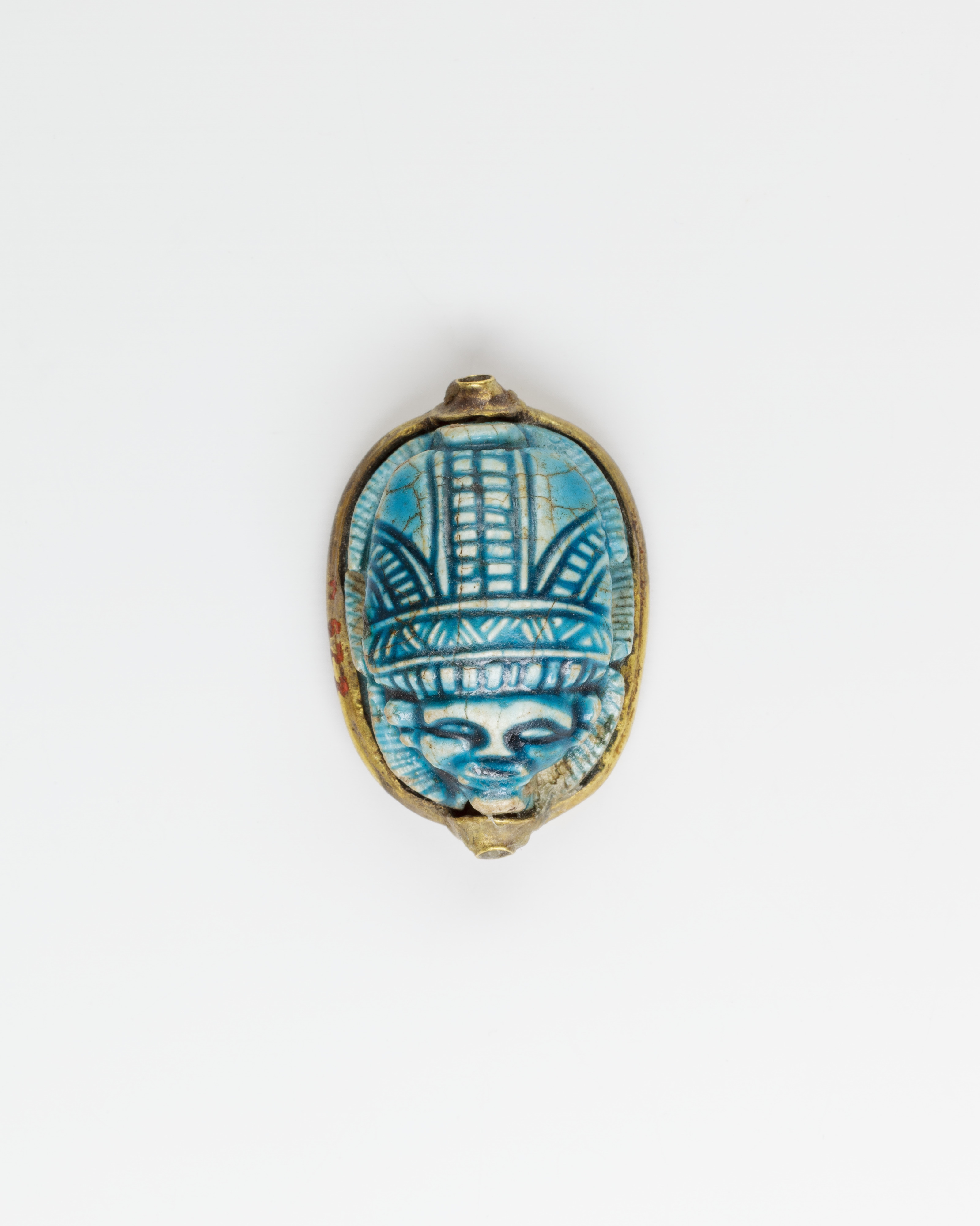 Human-headed scarab with device of sphinx and winged uraeus