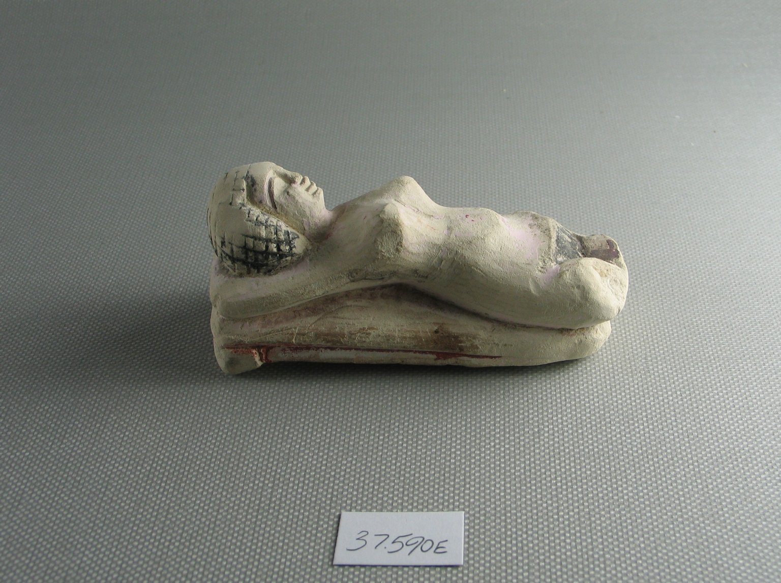 Small Figure of a Woman Lying on a Couch