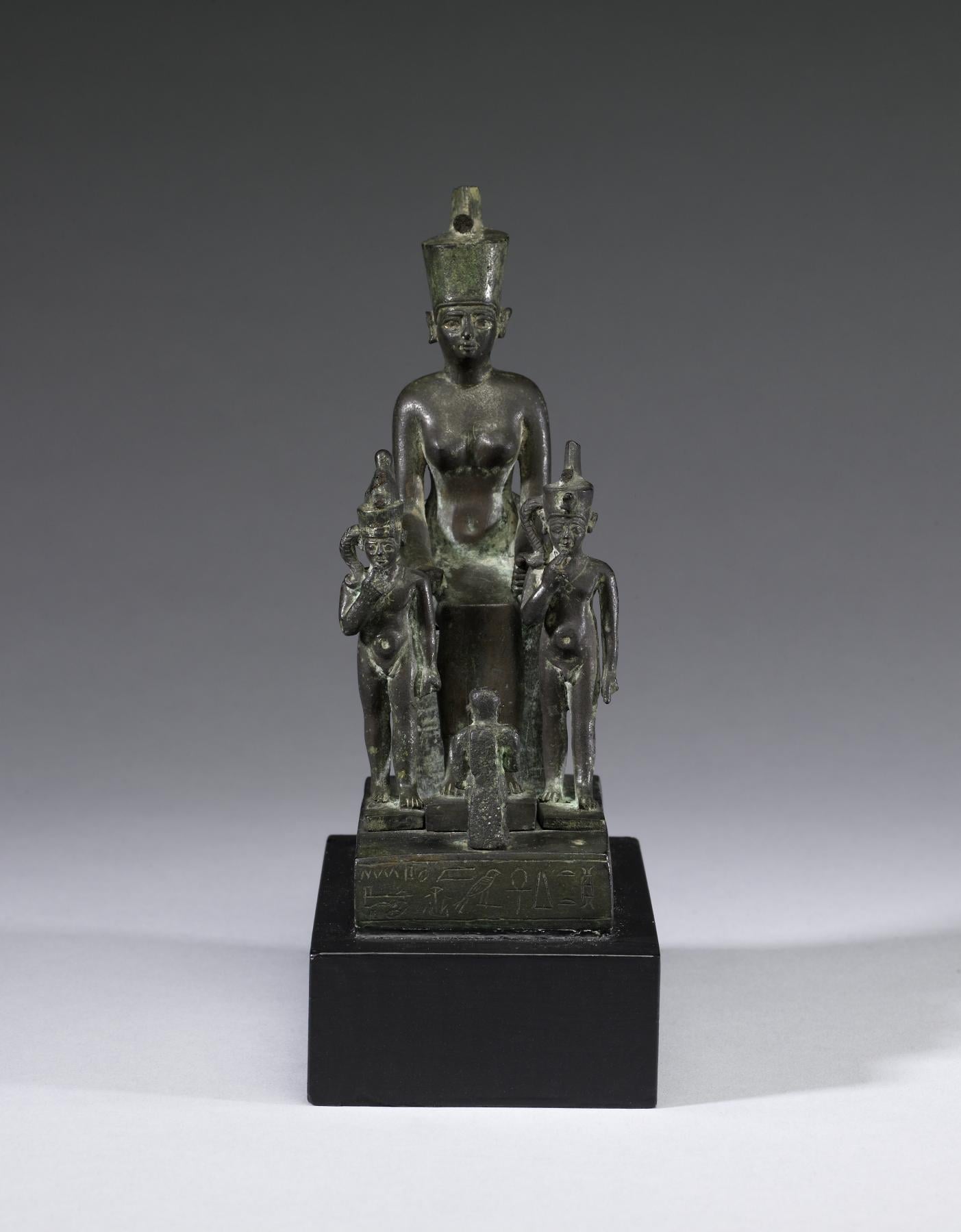 Figure Ensemble of the Goddess Neith with Horus the Child (twice) and a Worshiper