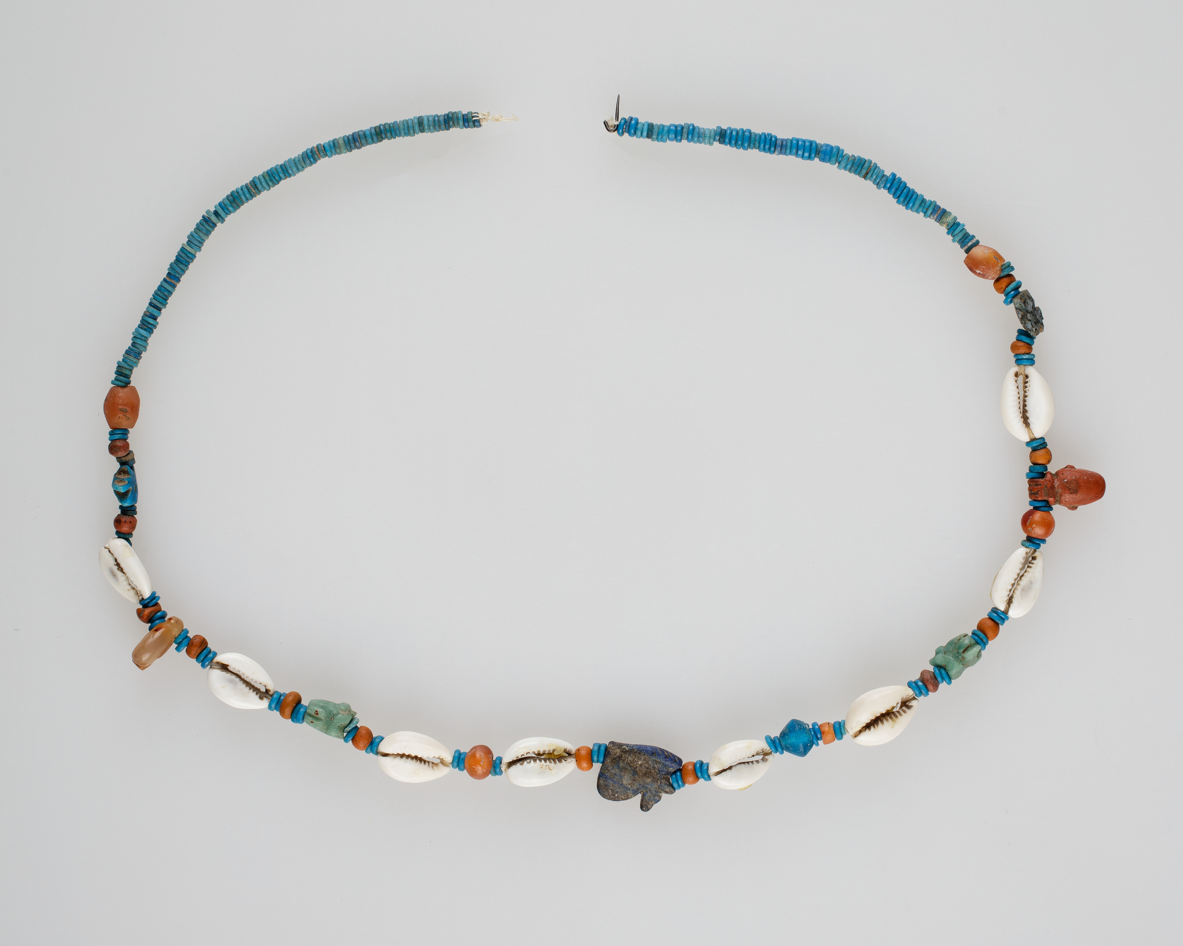 String of beads and amulets (wedjat eyes)