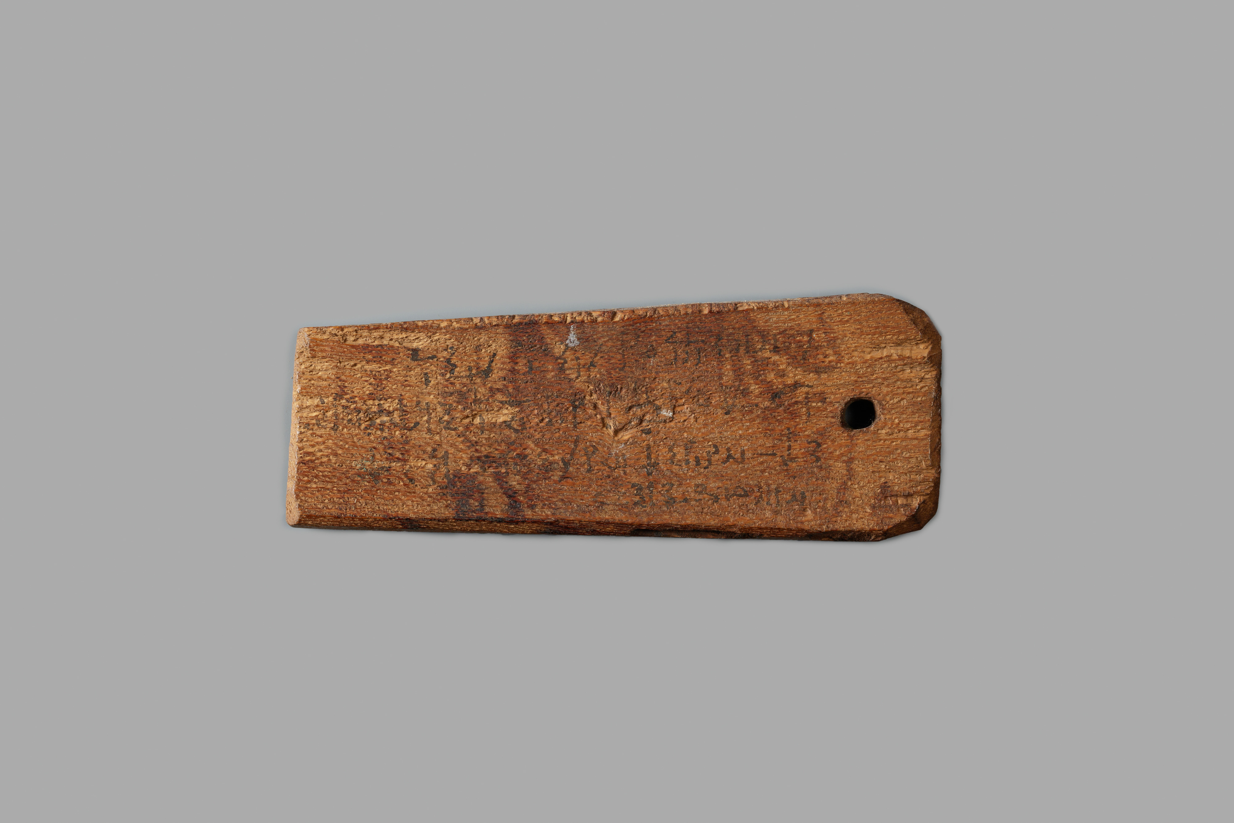 Mummy label of Senpnouthe, daughter of Sulis; her mother Taphiomis