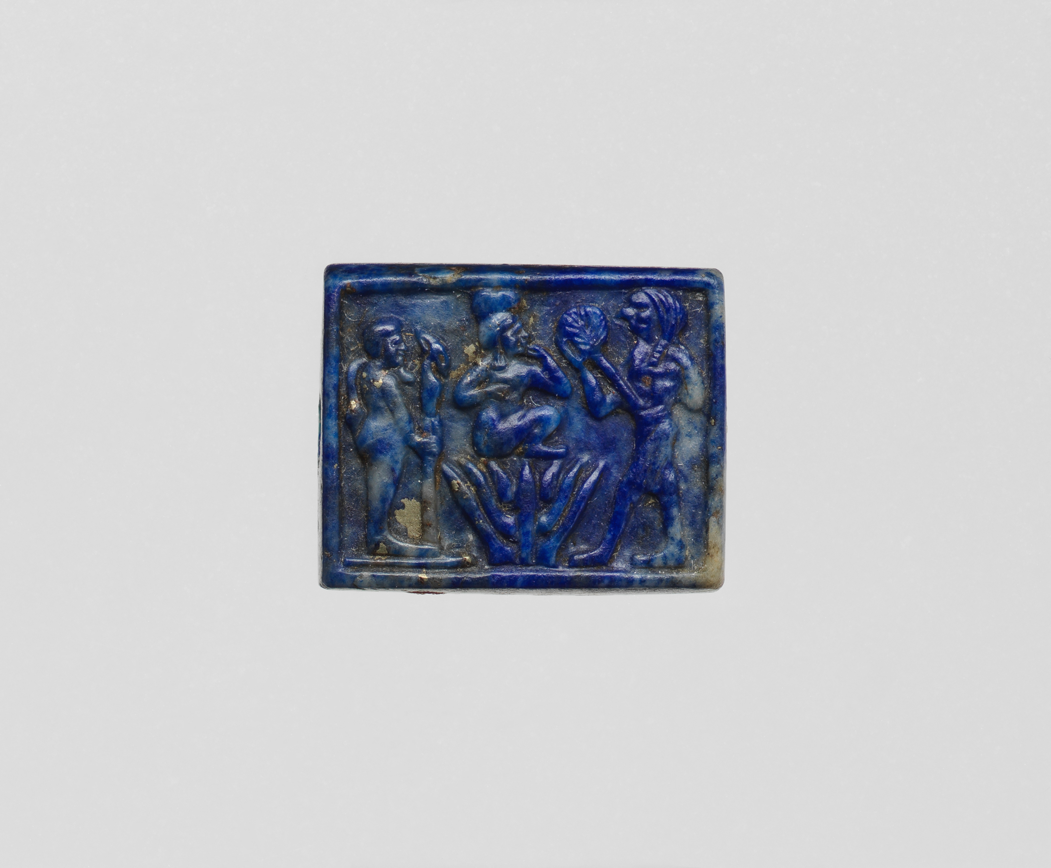 Plaque with Harpokrates (or similar) on a lotus, Ptah and Re-Harakhty(?)