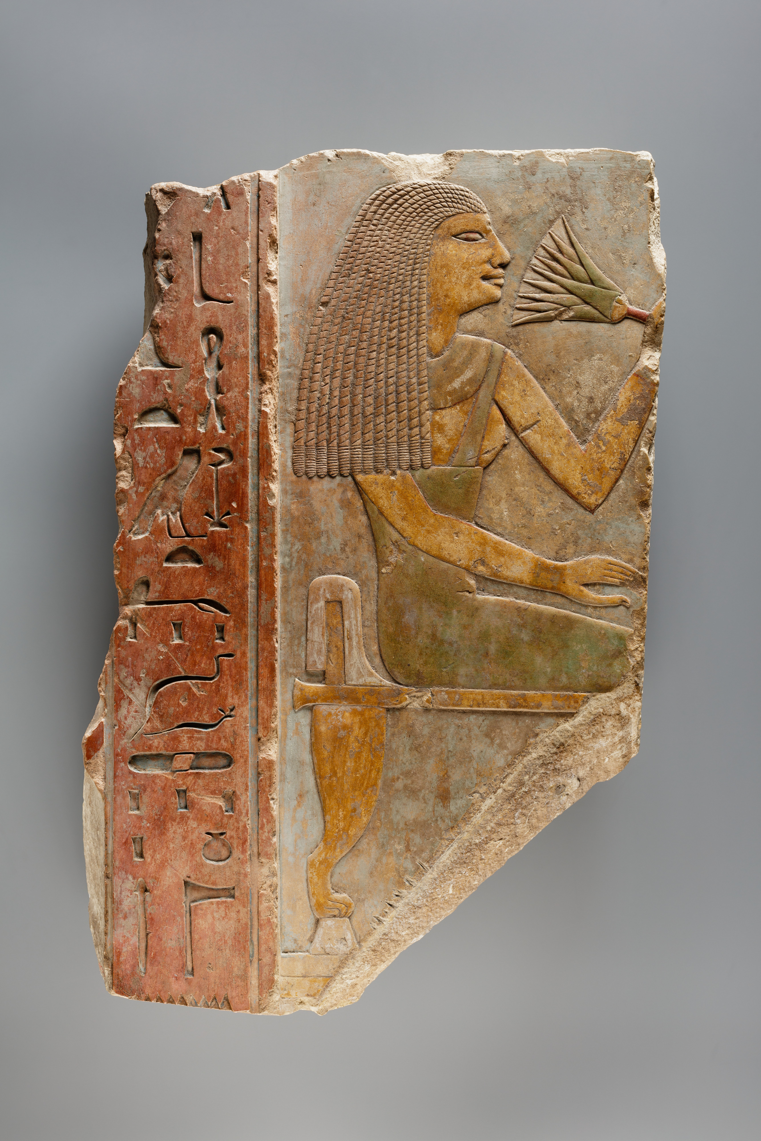 Relief Showing a Seated Woman Smelling the Blossom of a Water Lily