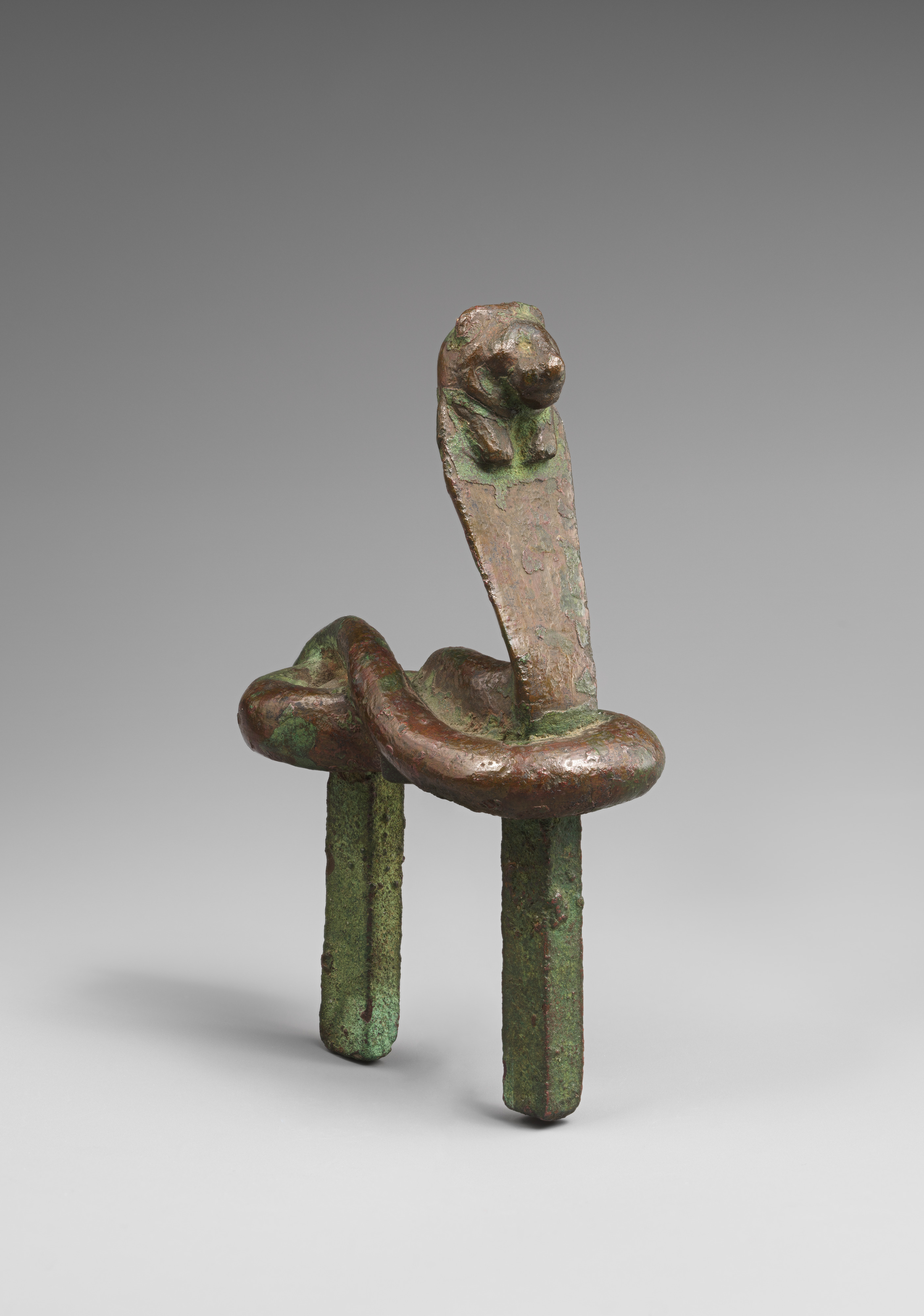 Figure of a rearing cobra with lion head