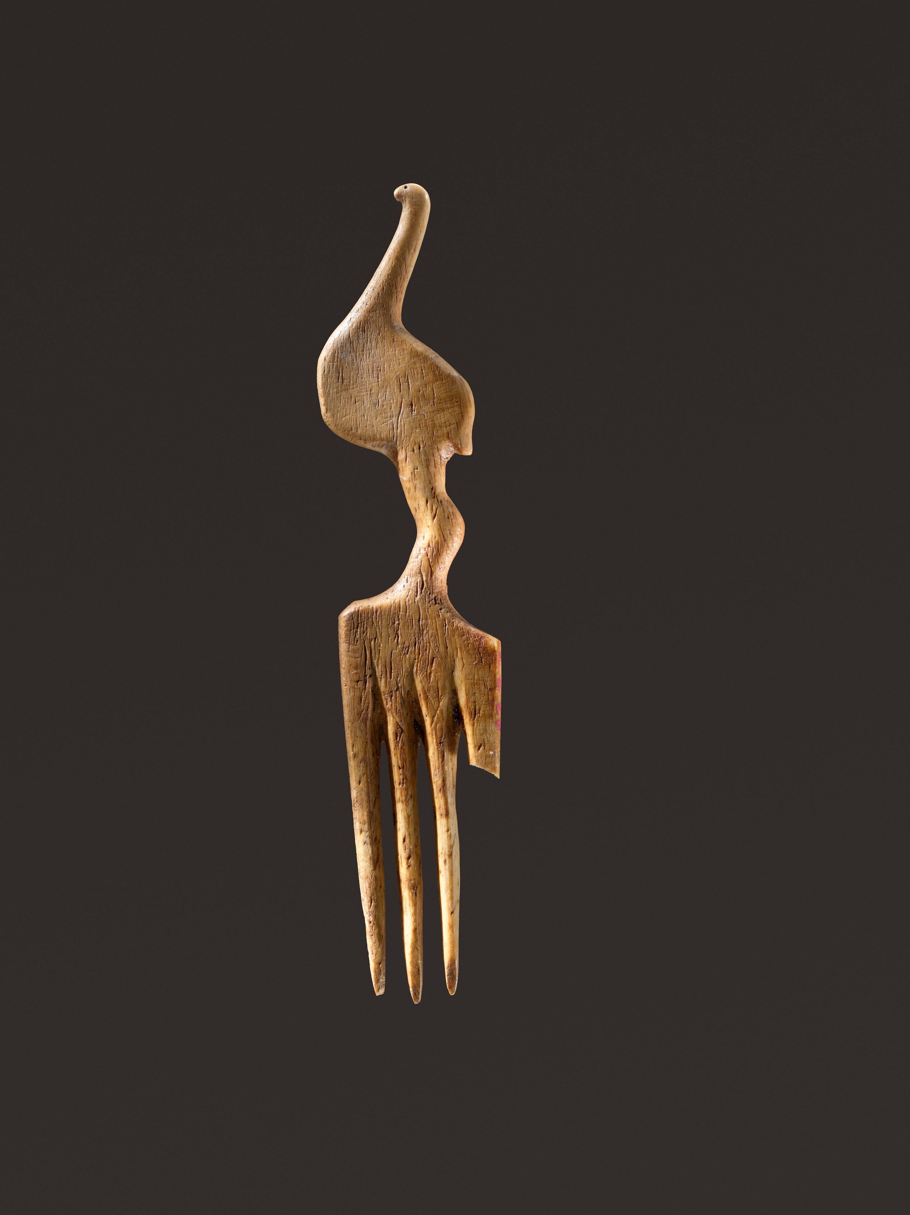 Comb decorated with an ostrich
