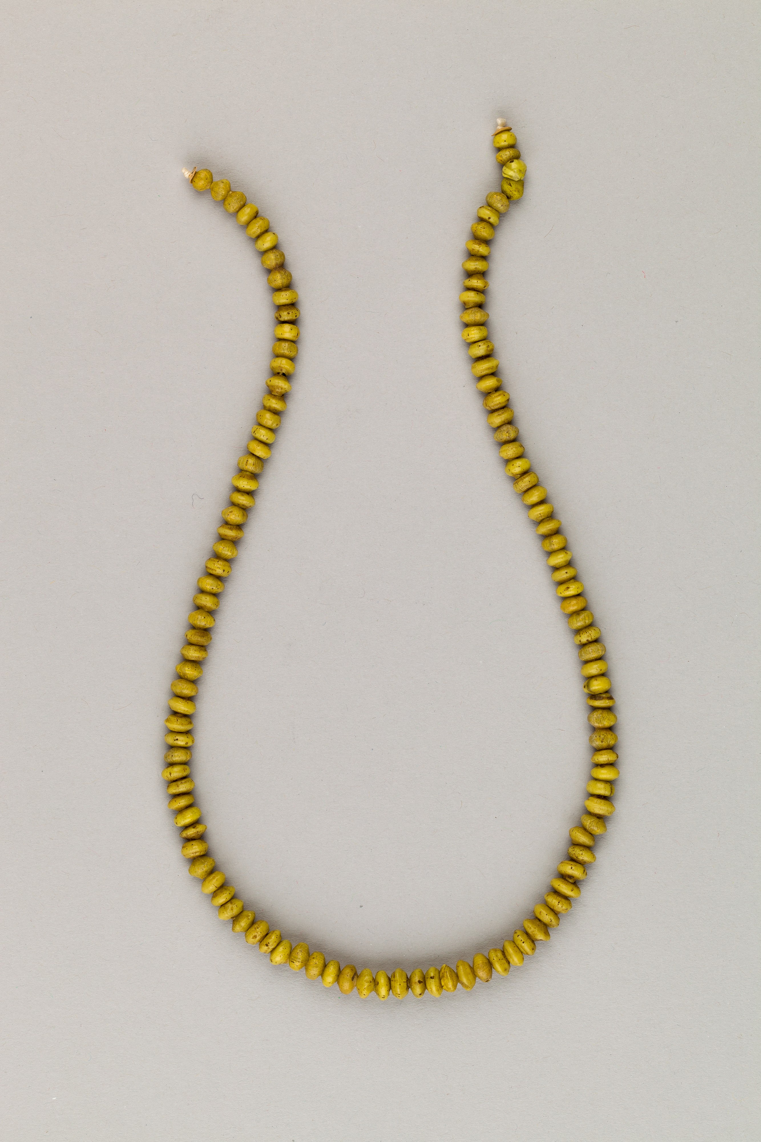String of 115 discoid ridged beads