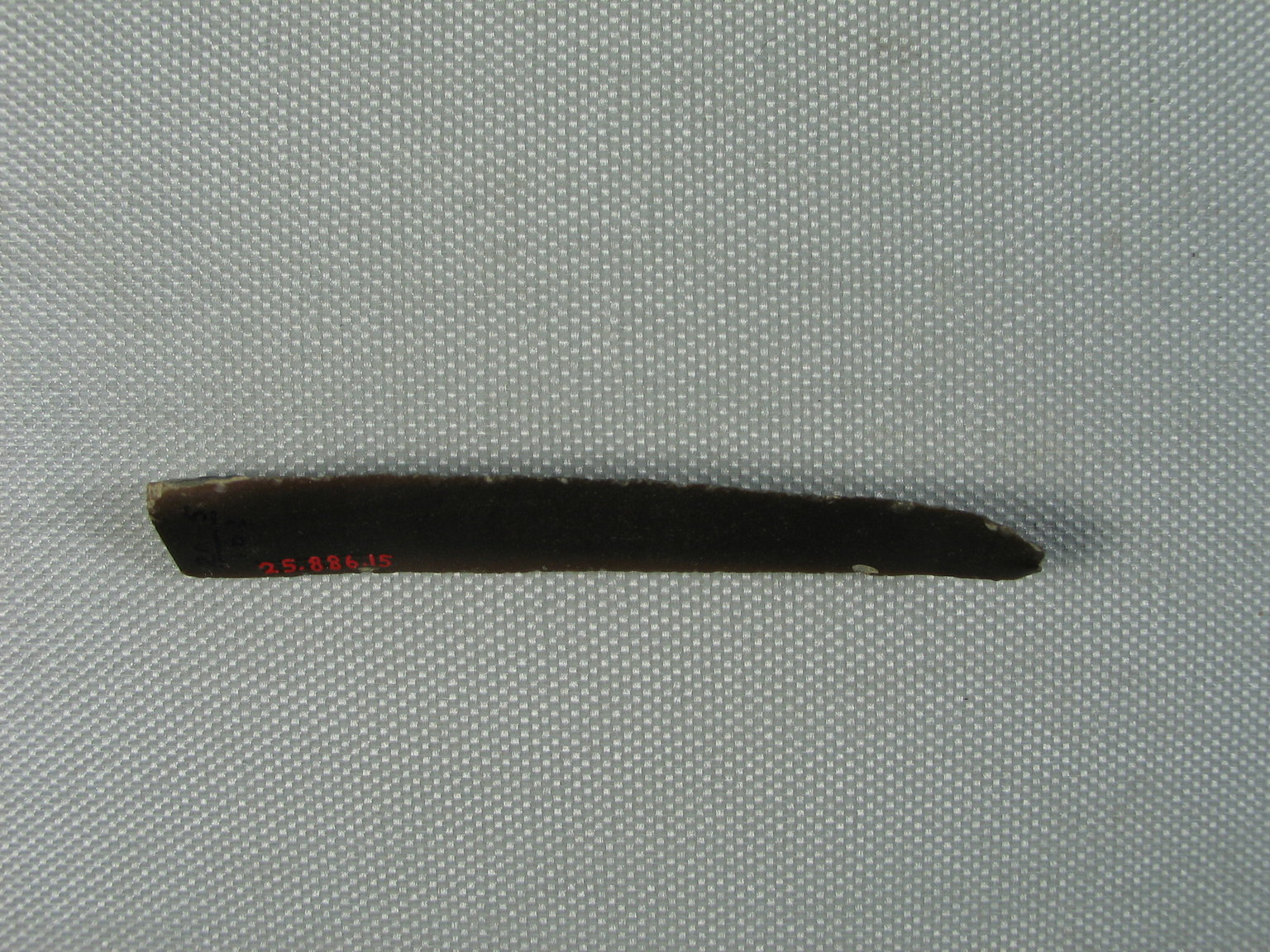 Slender Dark Brown Flint with Two Worked Edges