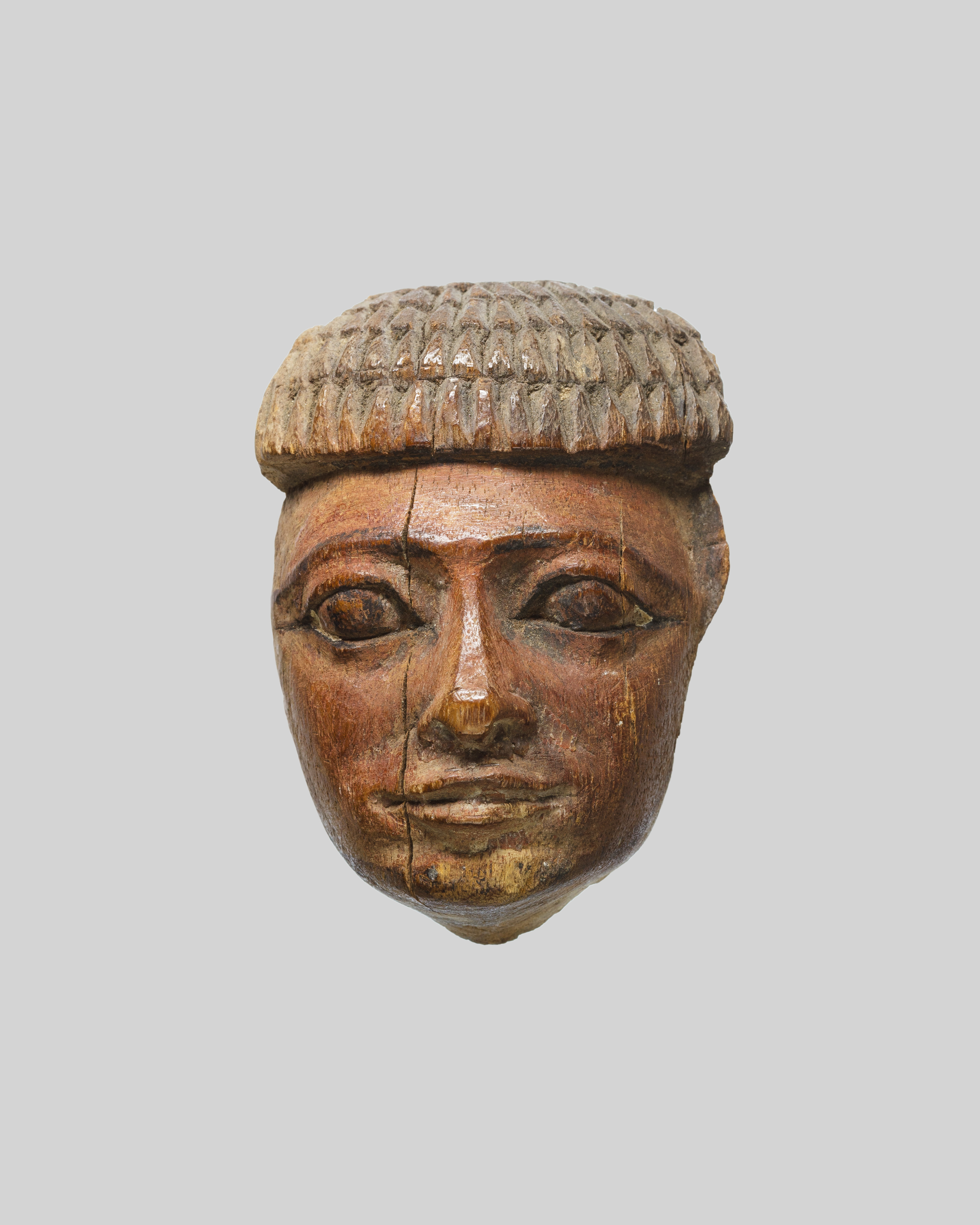 Face of a Man with Part of a Short Echeloned Wig