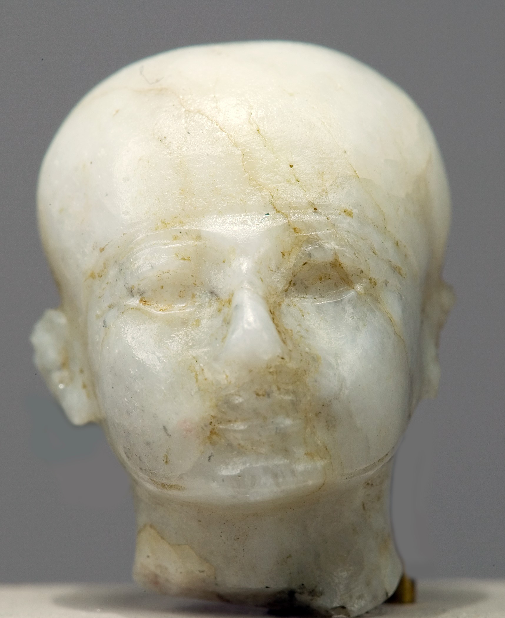 Head with cap and beardstraps, perhaps Ptah