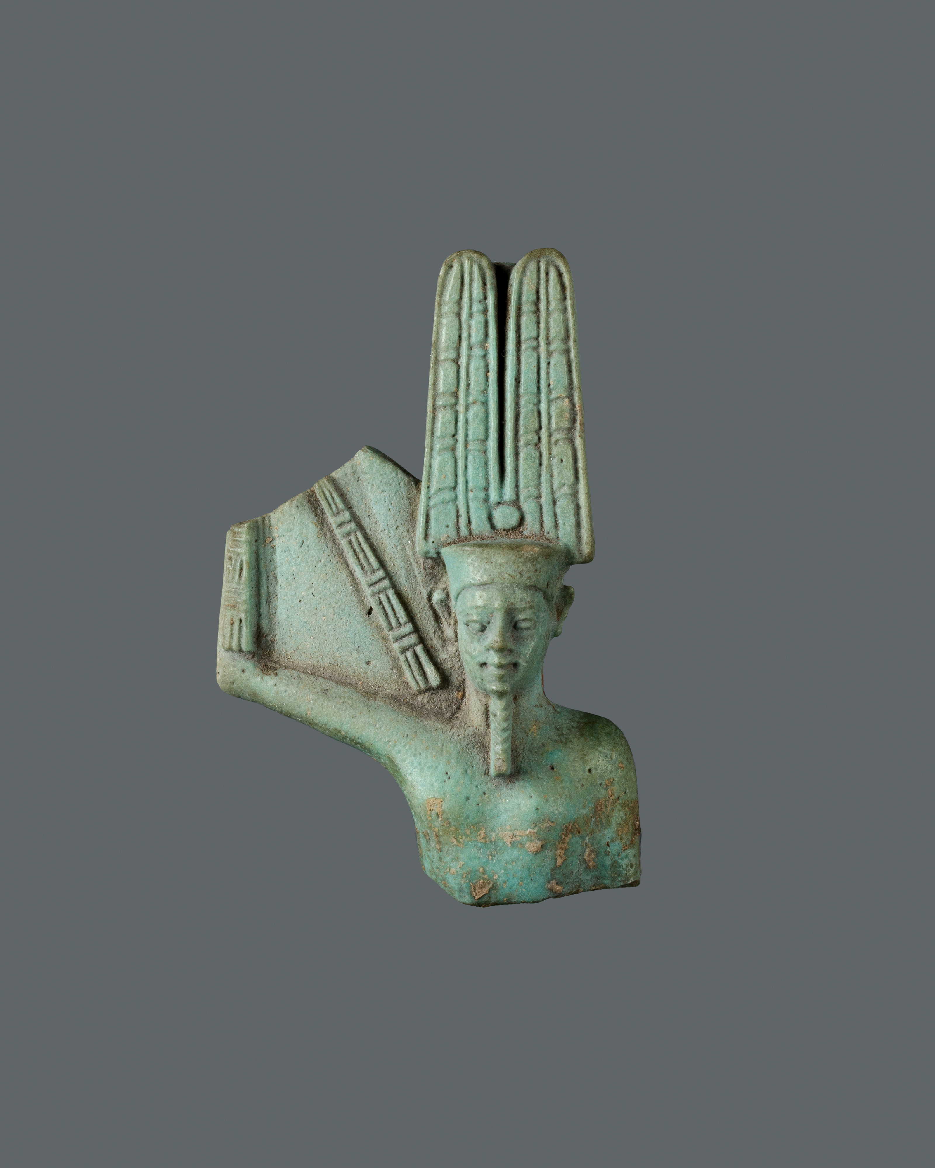 Fragment of Min statuette