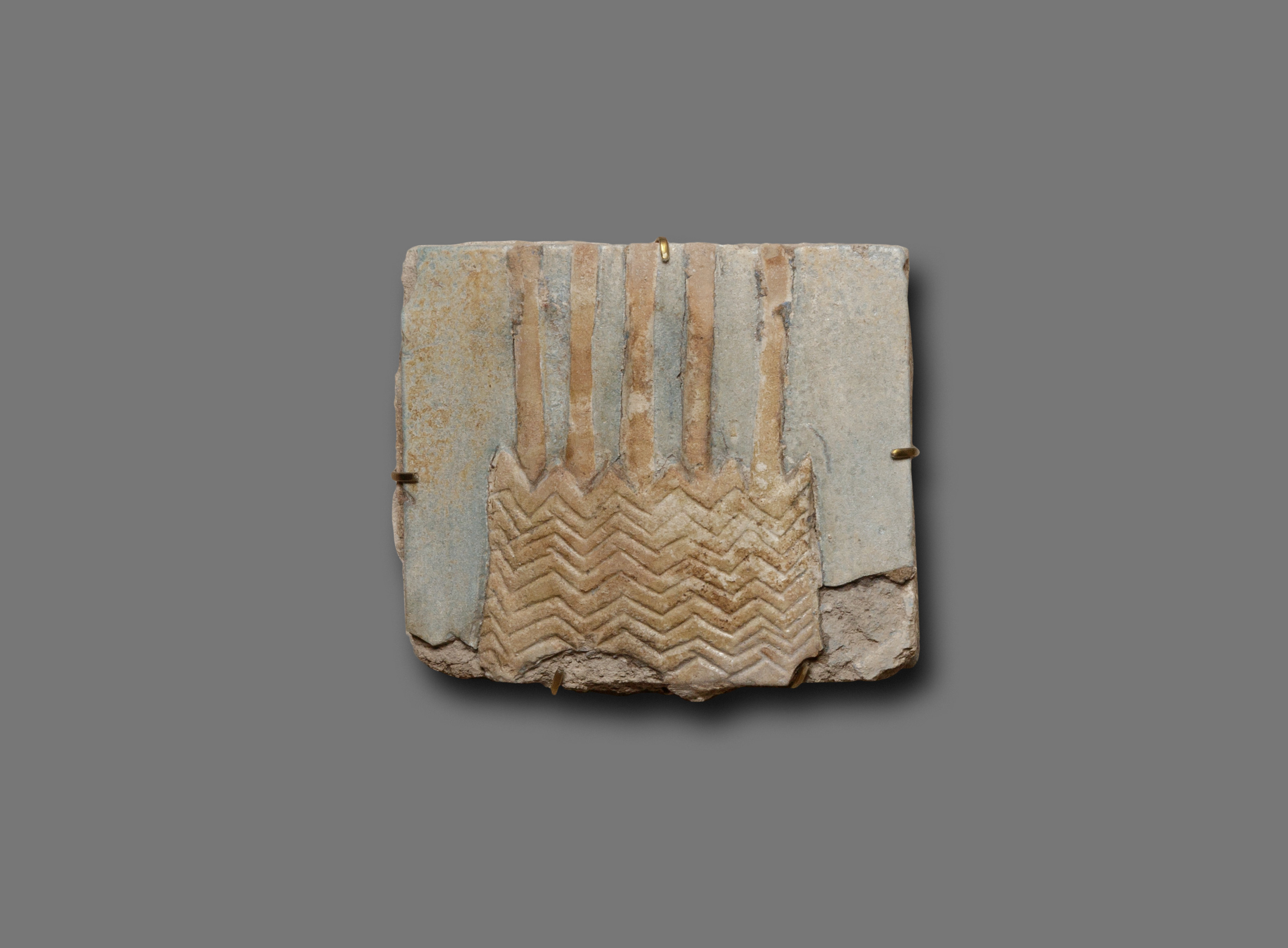Tile with five stems of a papyrus plant