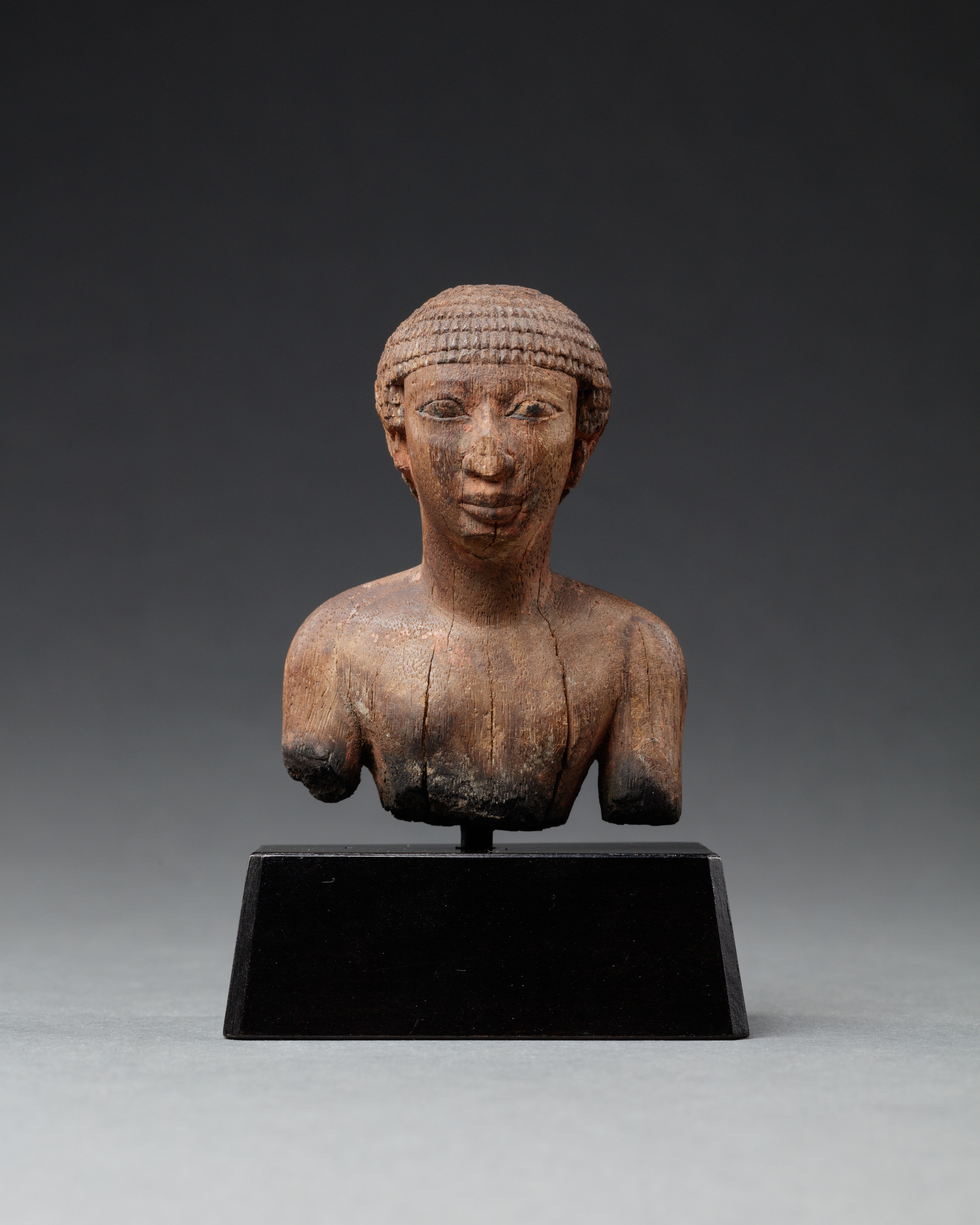 Upper Part of a Statue Probably Depicting a Man