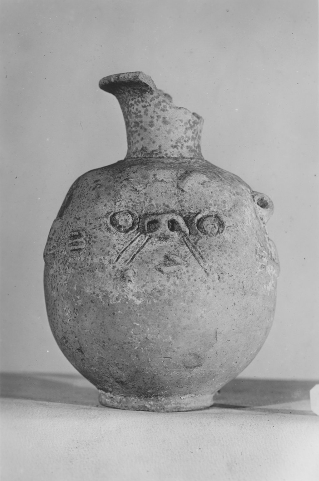 Vase with Face of Bes on One Side