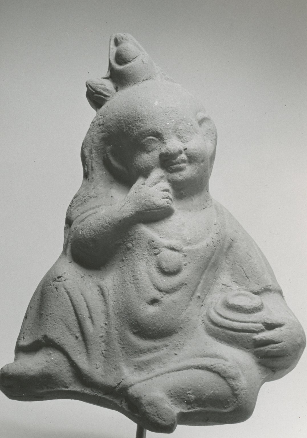 Seated Harpocrates with Jar