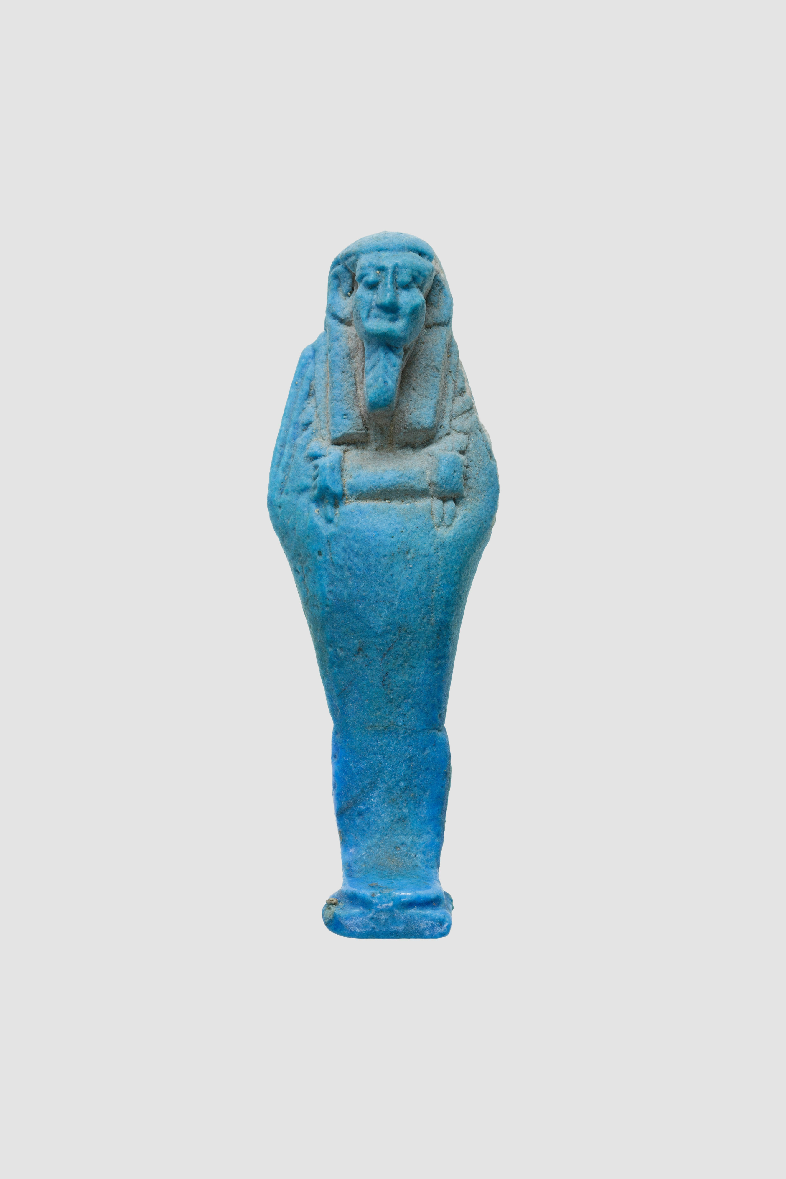 Uninscribed shabti from tomb of Nespekashuty