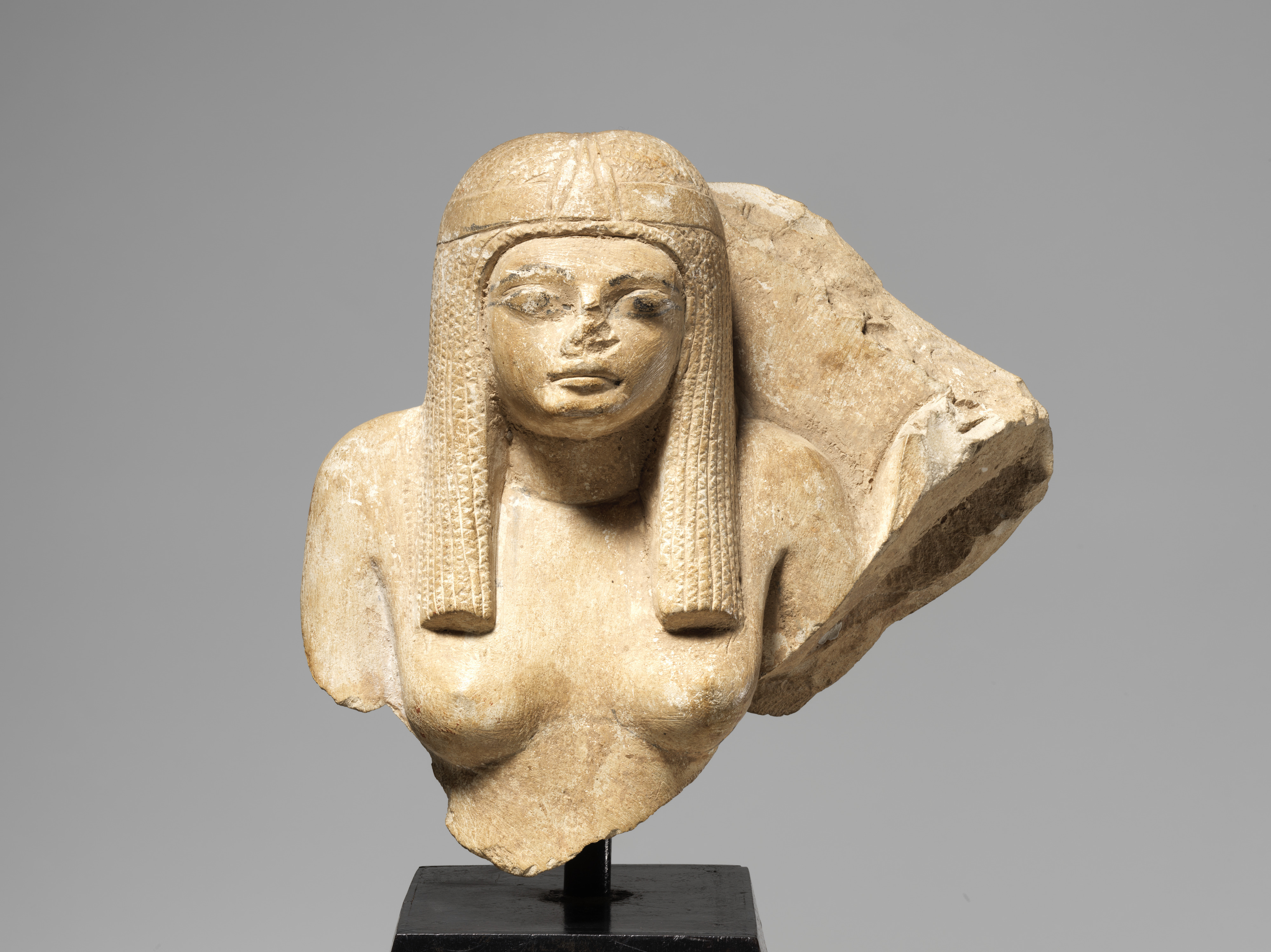 Upper Part of a of  Woman from a Pair Statue