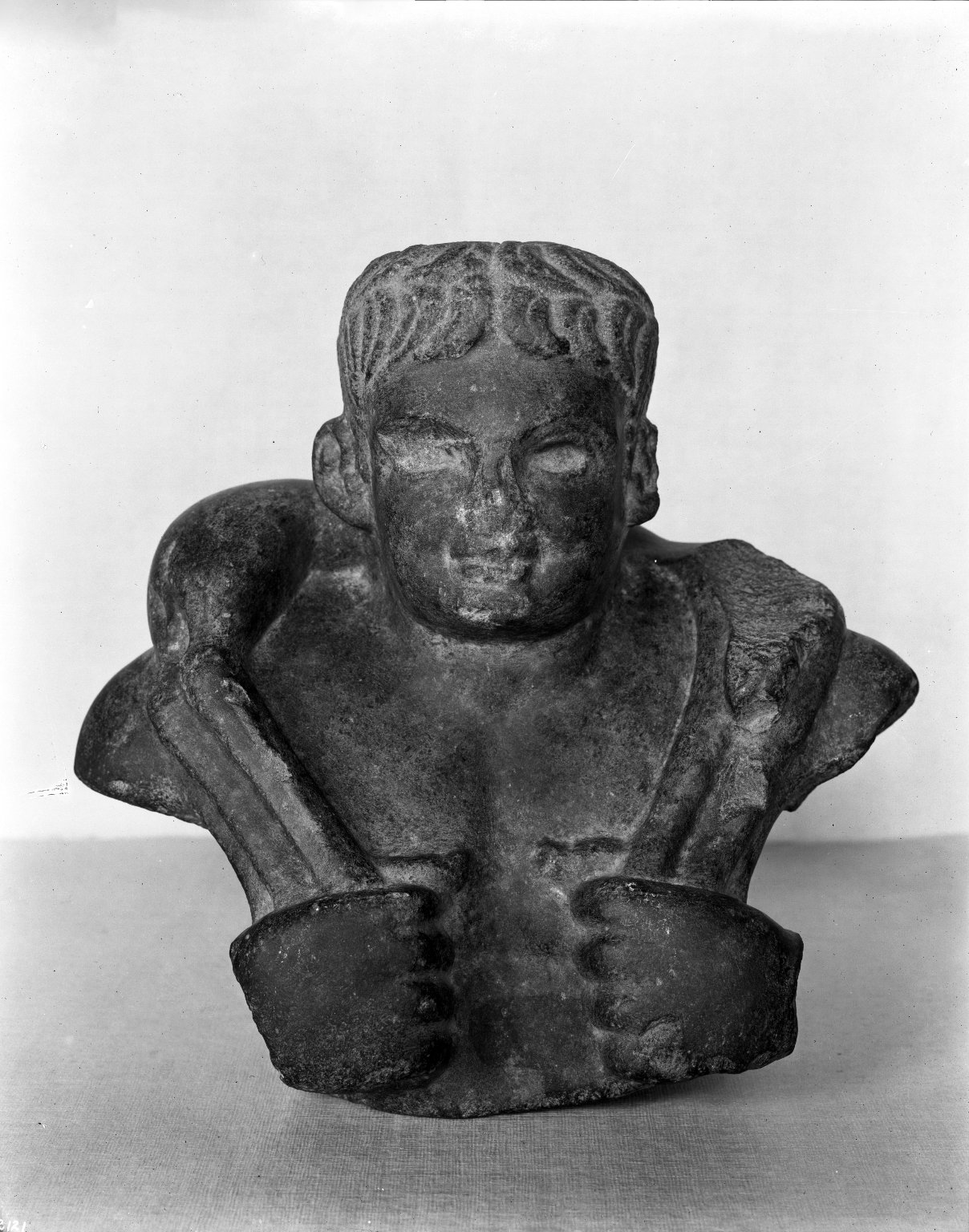 Head and Shoulders of Man Bearing Kid on Shoulders