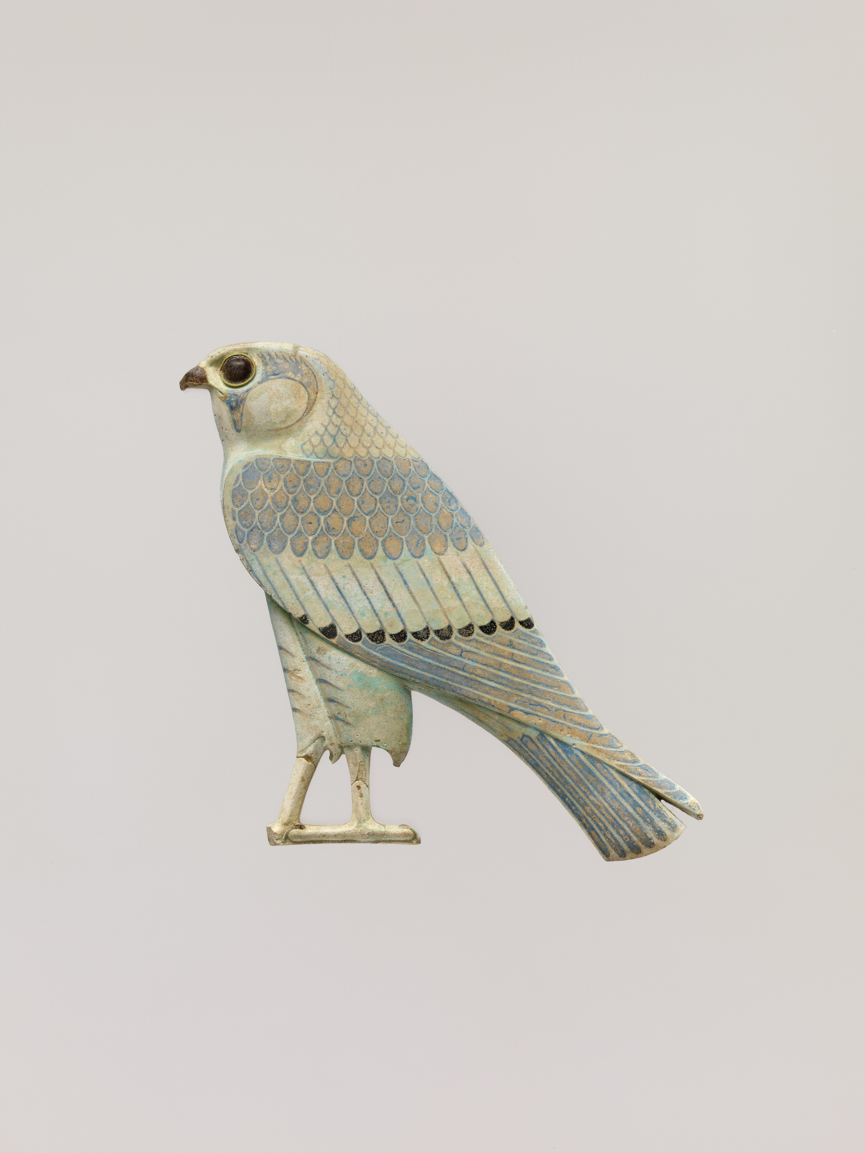 Inlay depicting a falcon