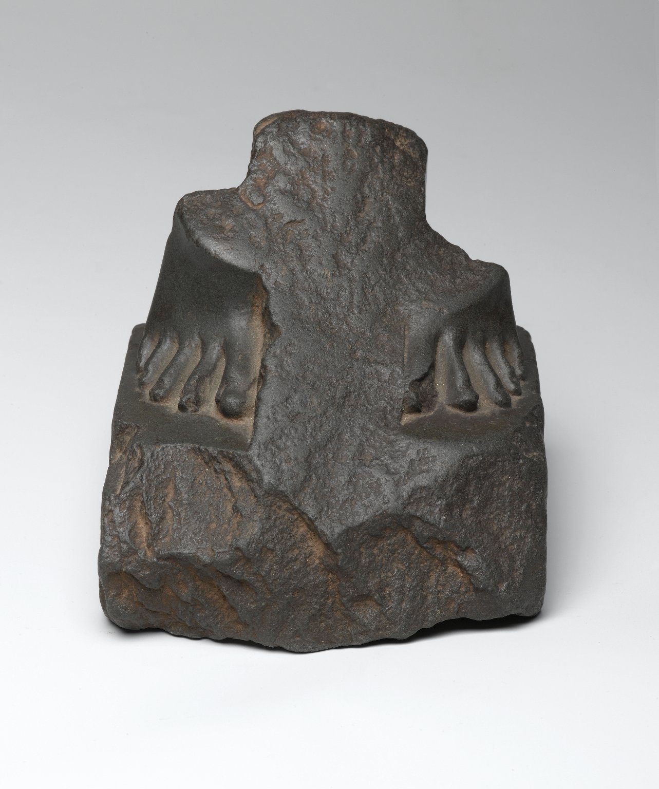 Fragment of the Feet and Base of a Statue