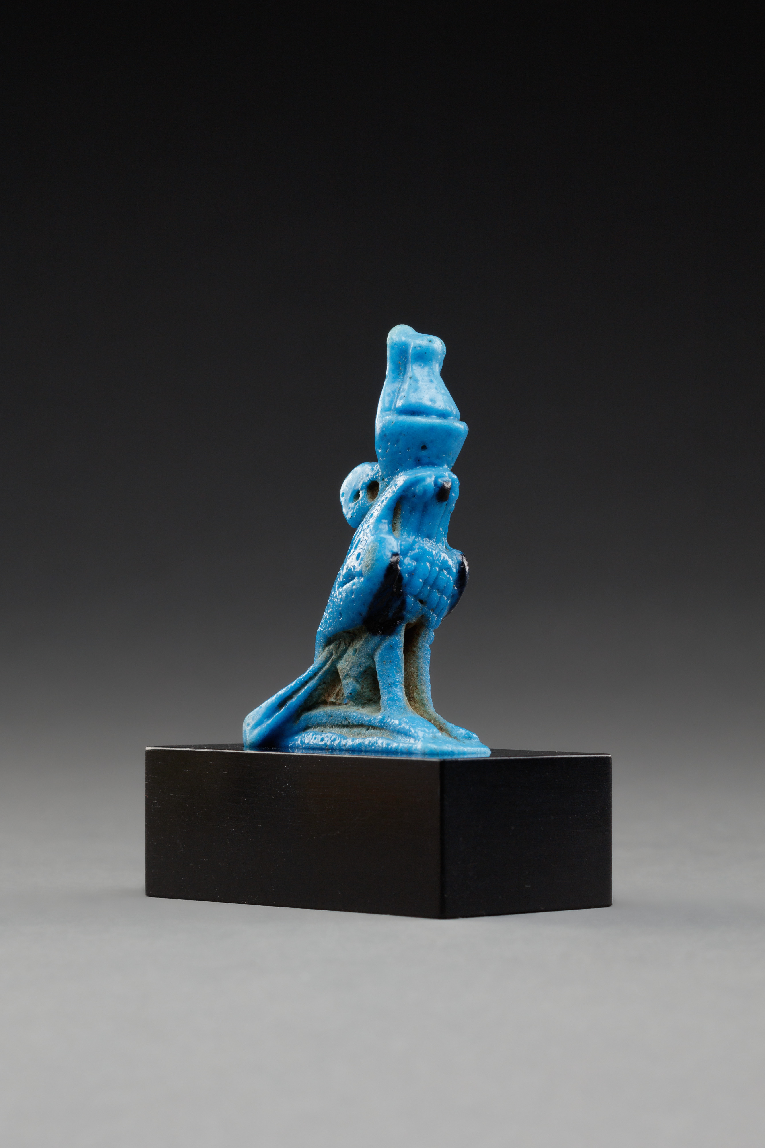 Horus amulet in the shape of a falcon with the double crown