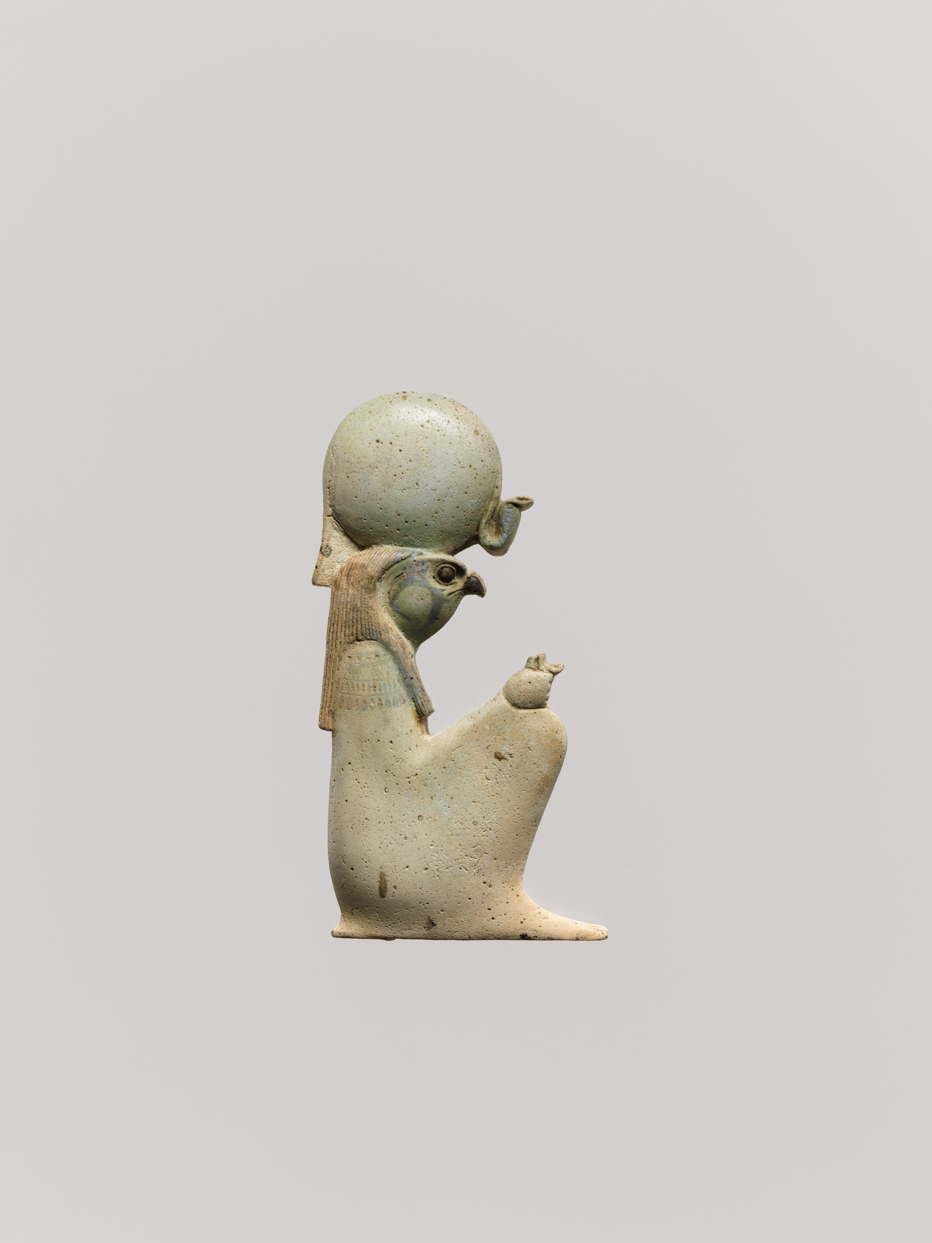 Inlay depicting the squatting god Re