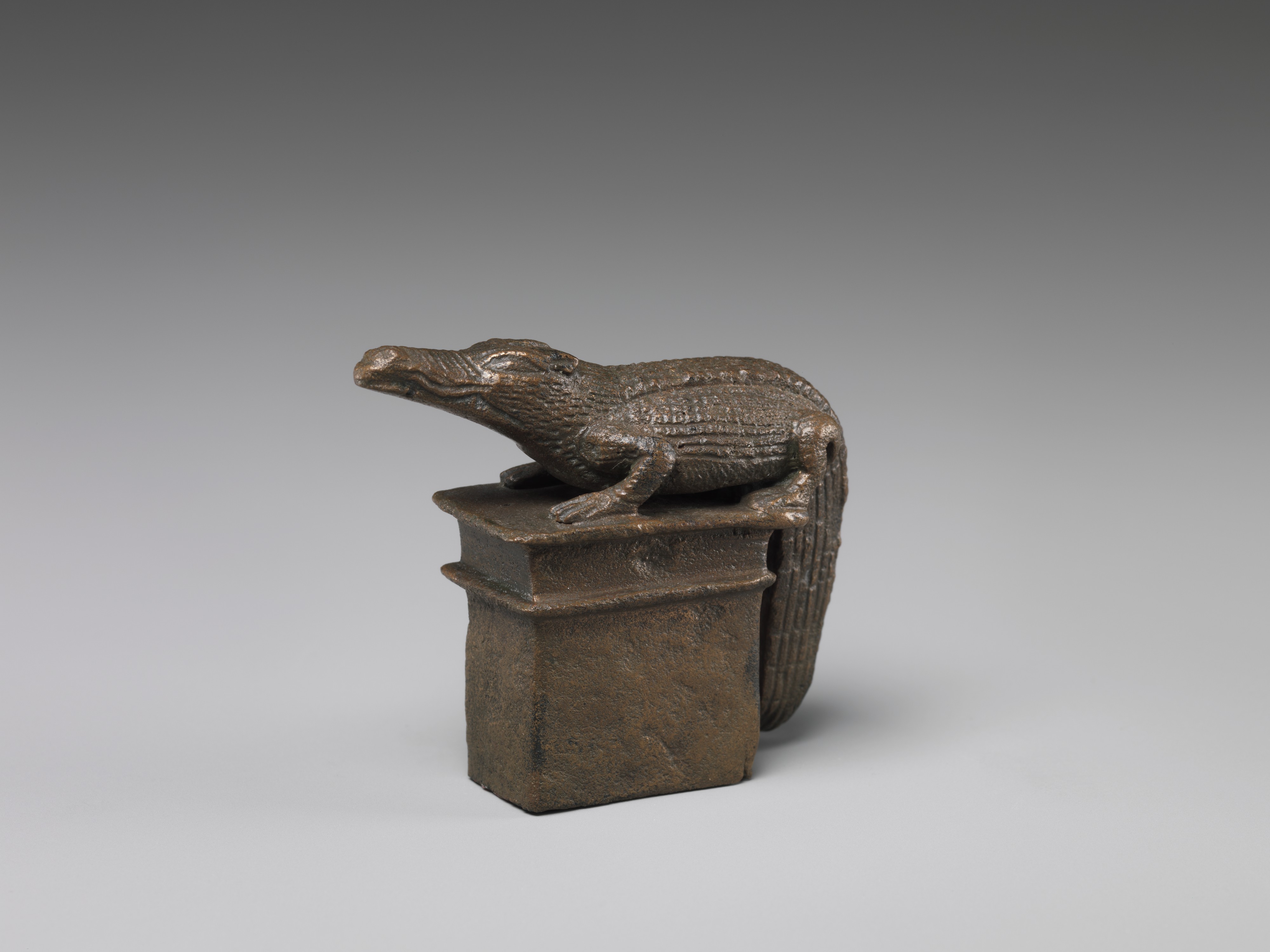 Crocodile on a shrine-shaped base