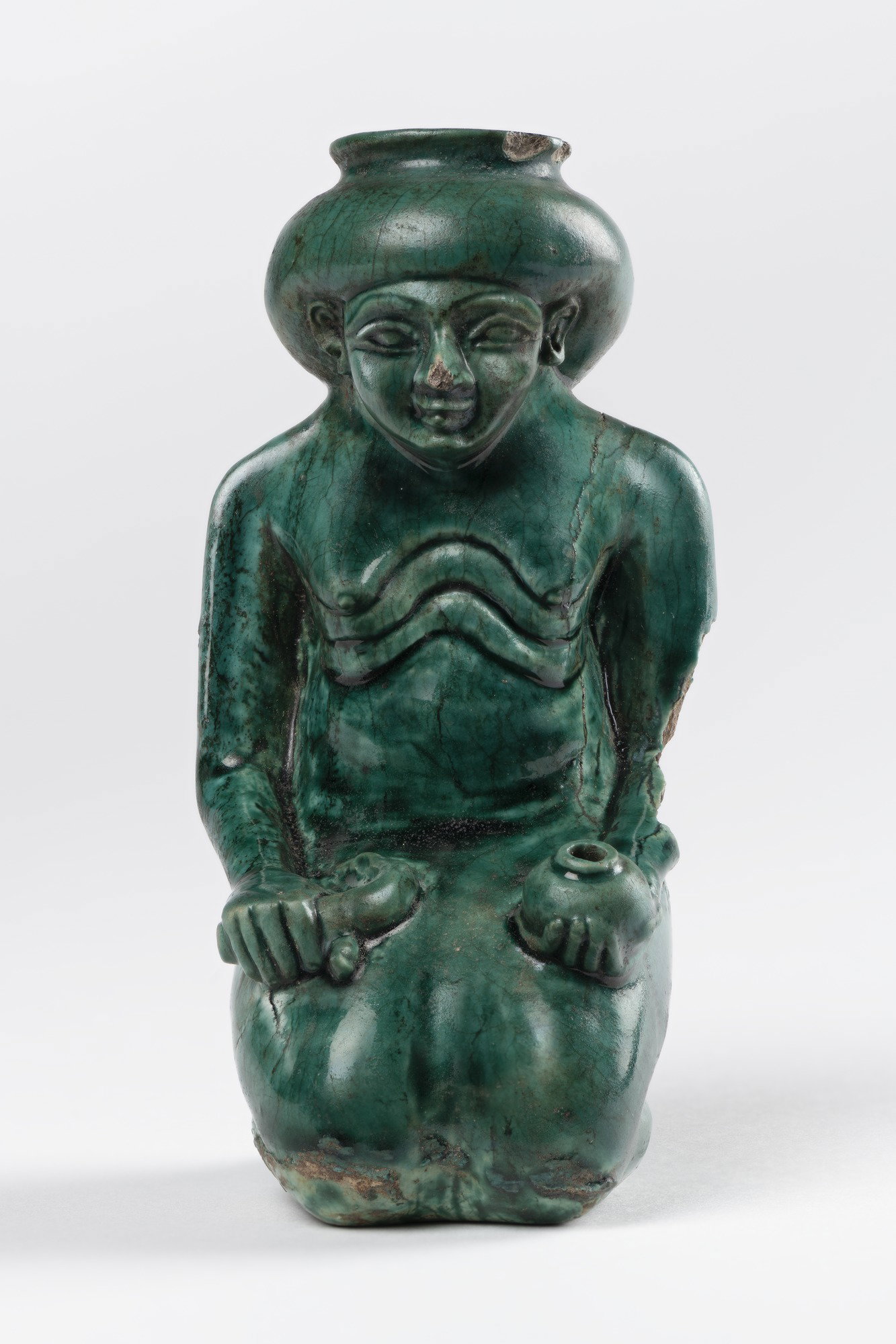 Vessel in the Form of a Kneeling Woman