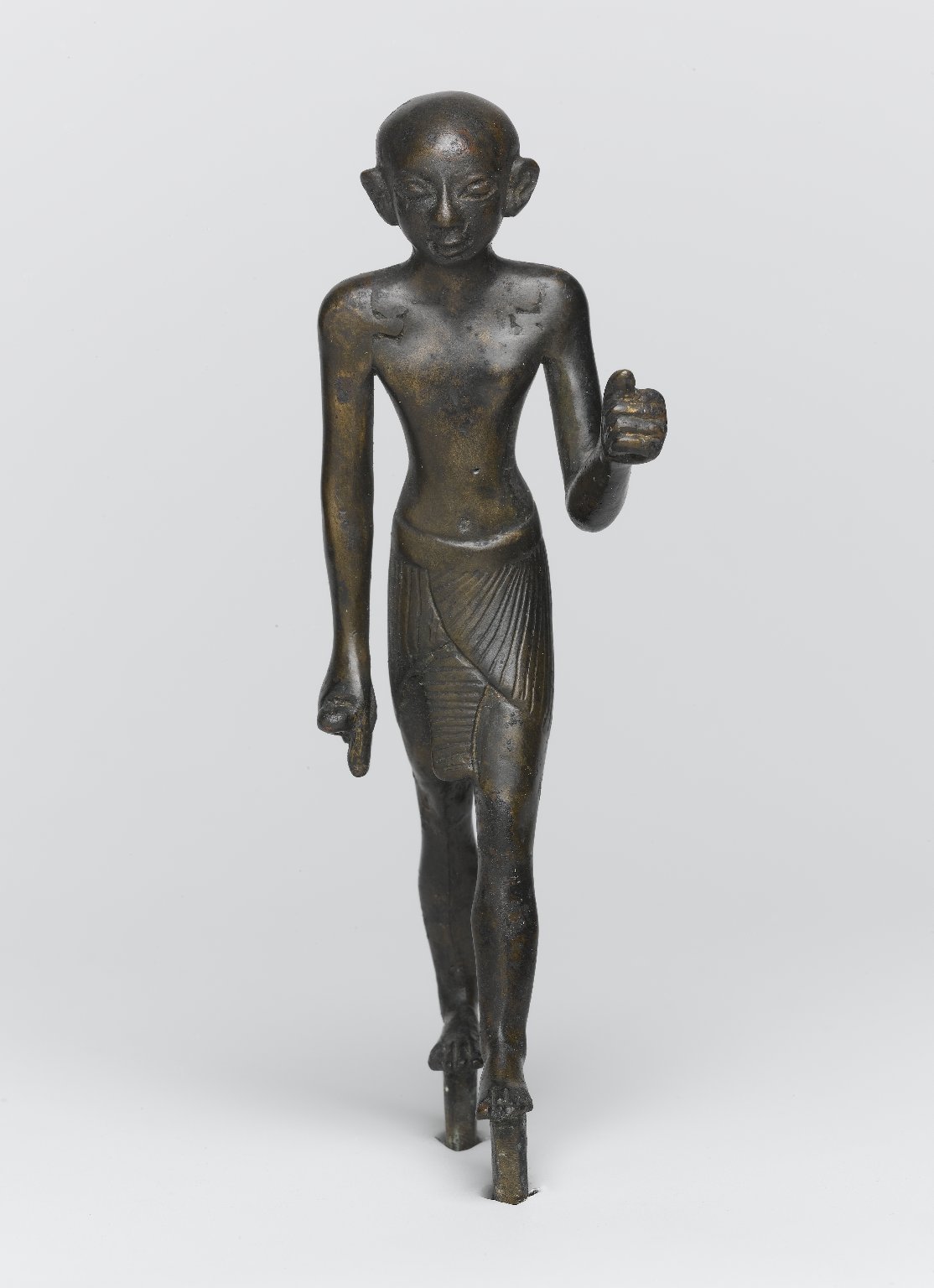 Striding Figure of a Priest