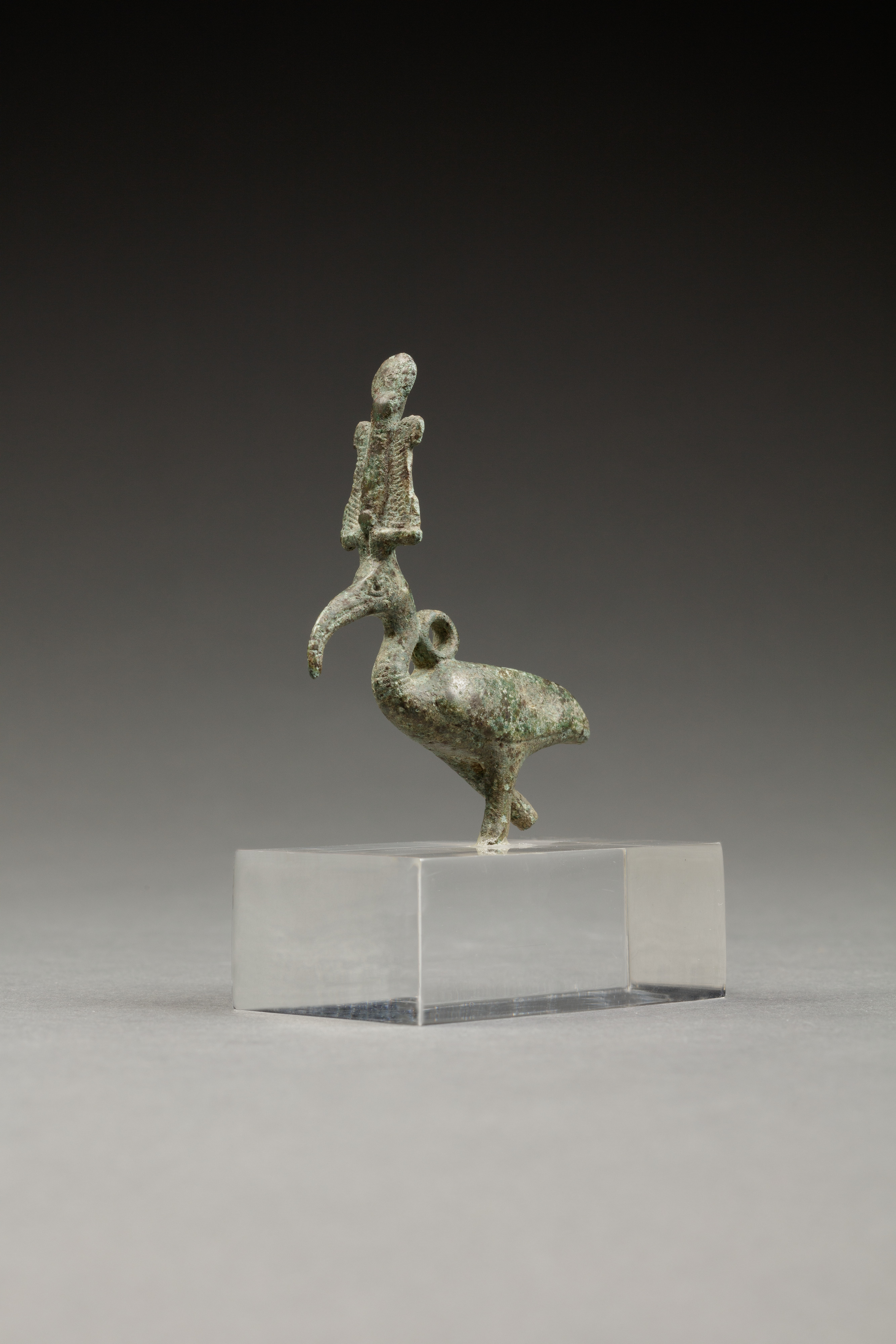 Pendant of an ibis wearing an atef crown