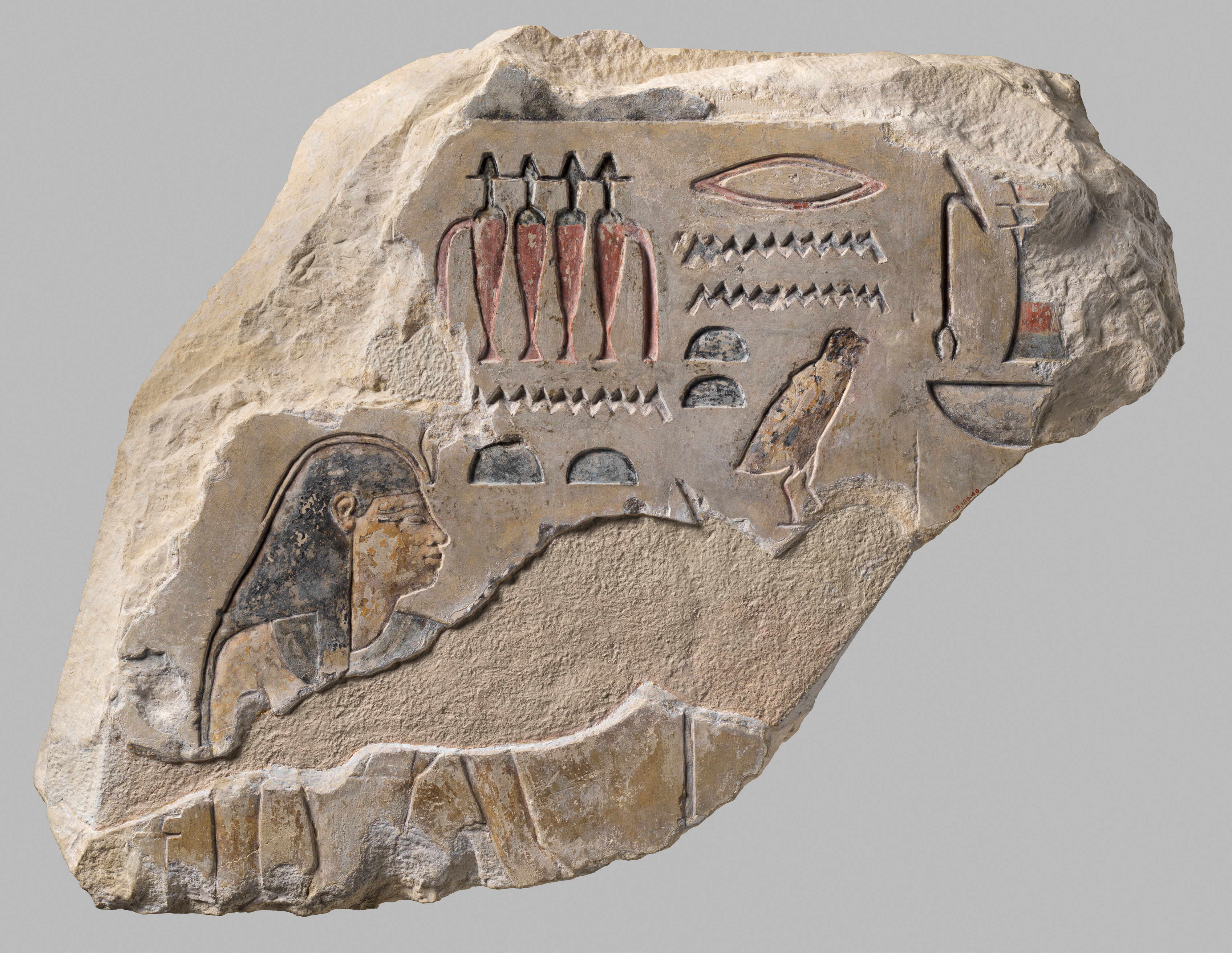 Relief of Renenutet, represented as a woman, from a deity procession